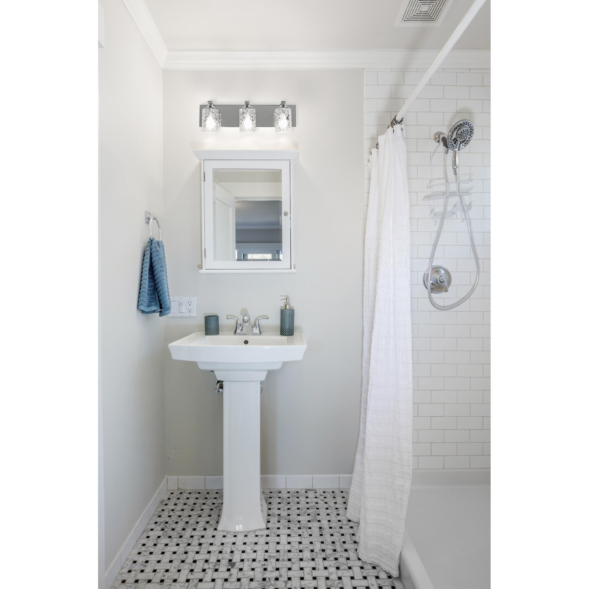 Shown in Polished Chrome finish and Clear Facetted glass