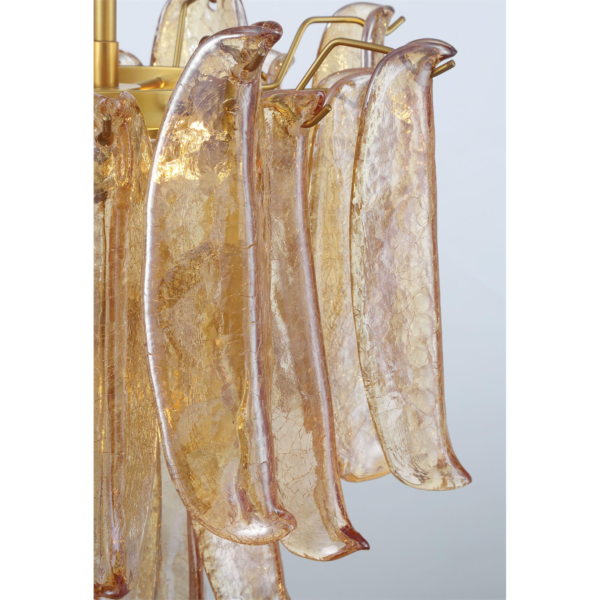 Shown in Legacy Brass finish and Amber Crackled glass