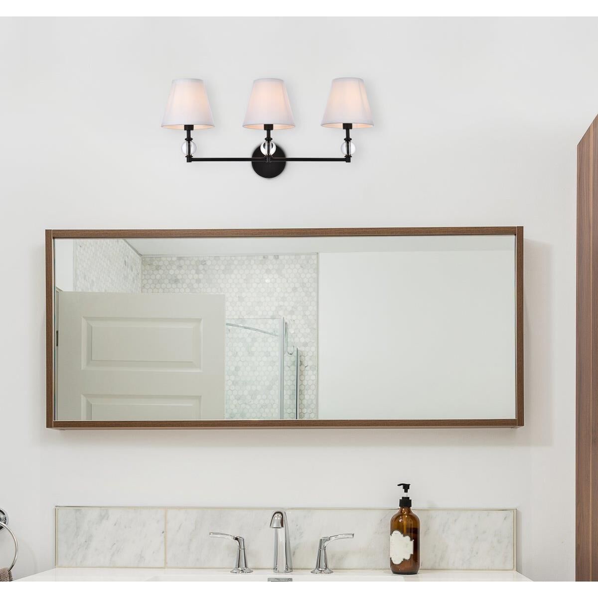 Shown in Black finish and Royal Cut Clear crystal and White Fabric shade