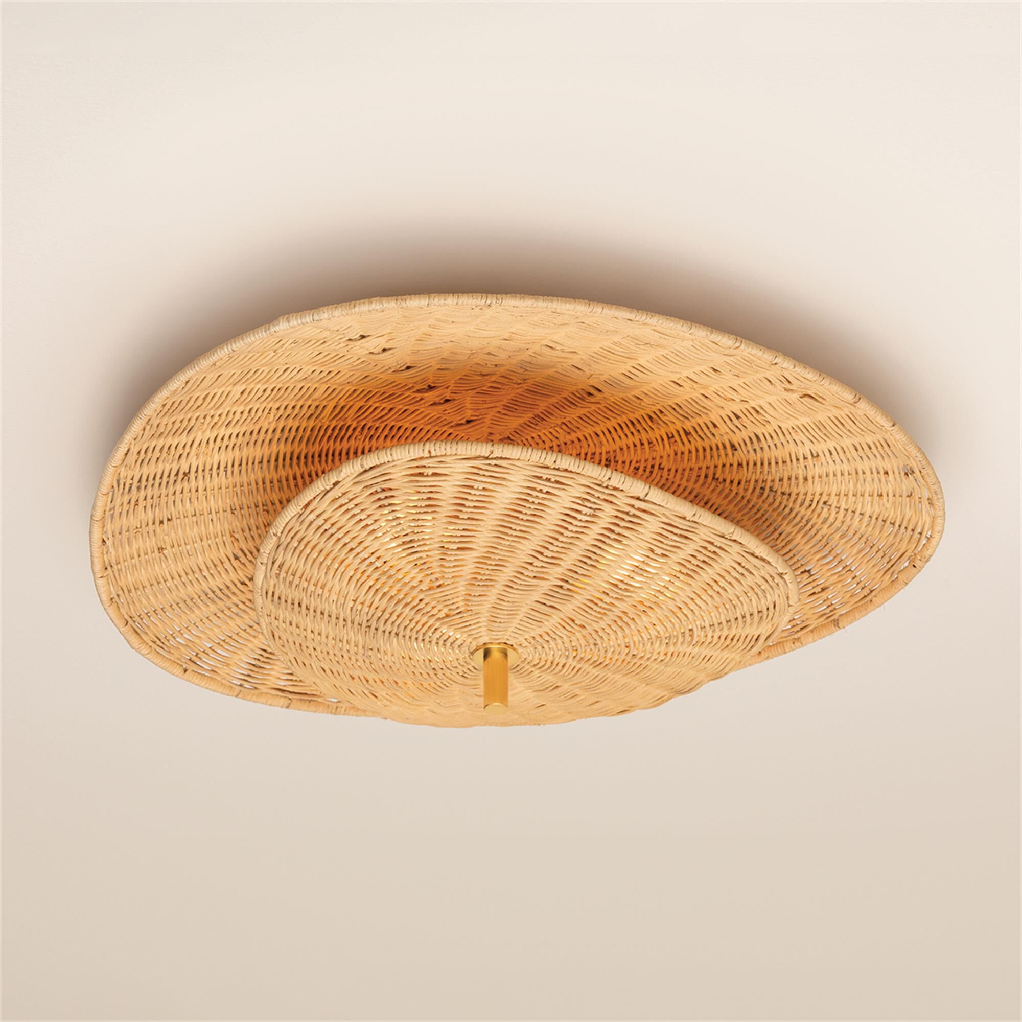 Shown in Aged Brass finish and Light Natural Wicker shade