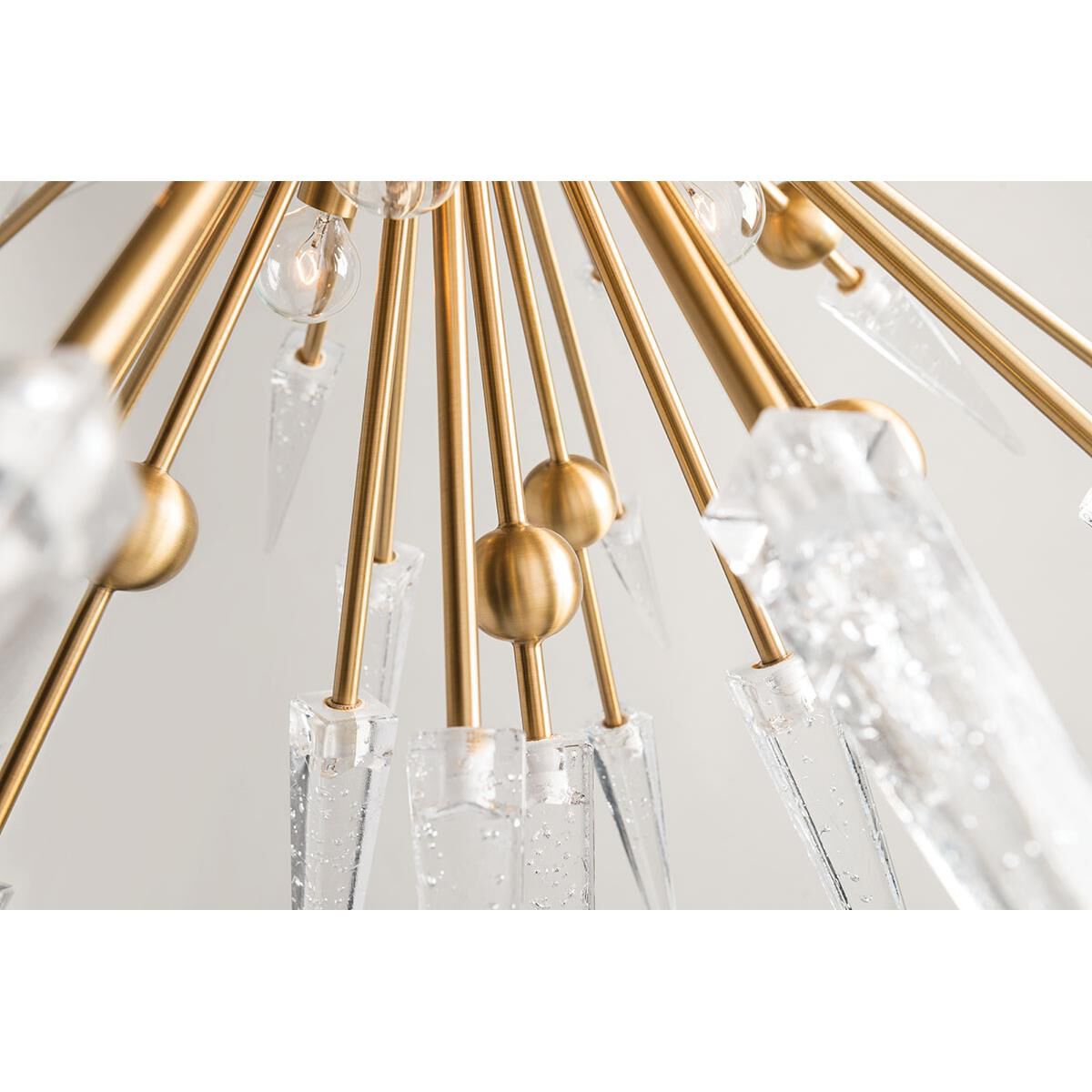 Shown in Aged Brass finish and Clear glass