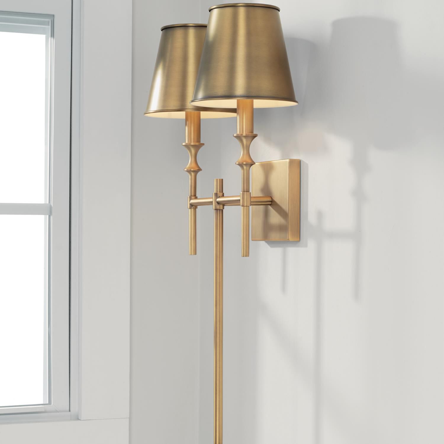 Shown in Aged Brass finish and Aged Brass Metal Stay-Straight  with White Interior shade