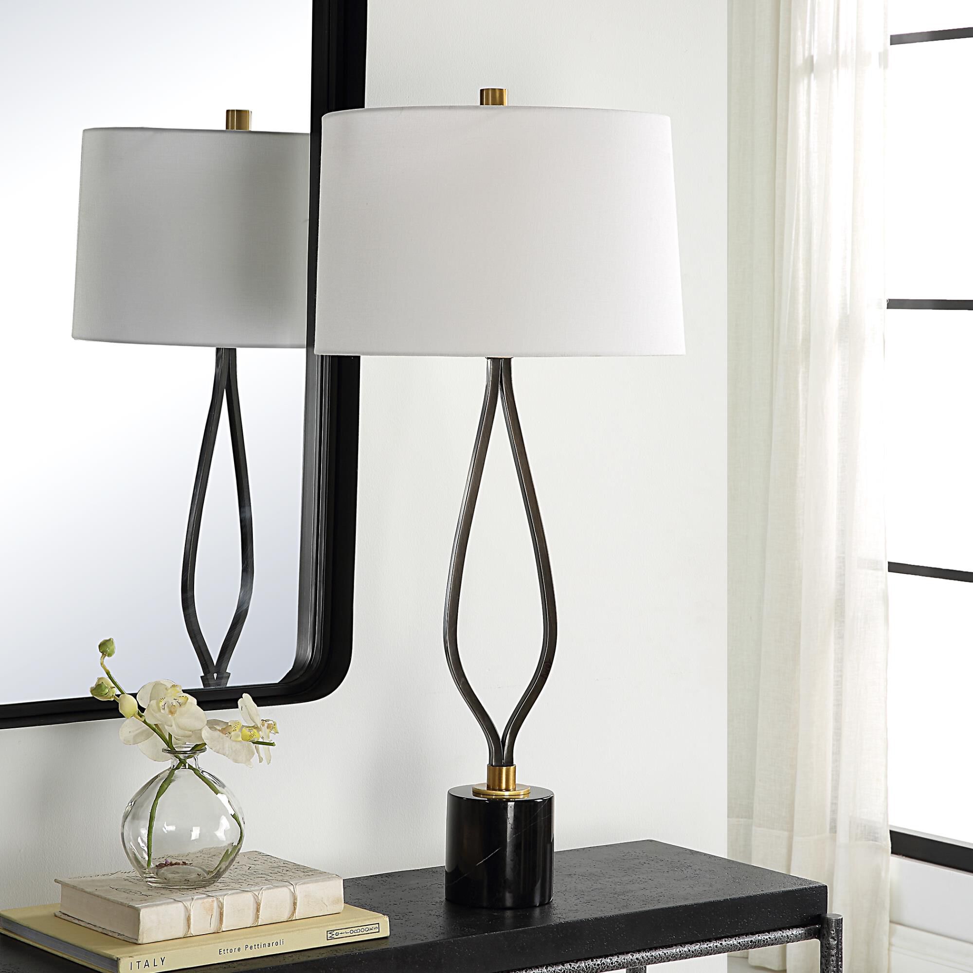 Shown in This Tall Table Lamp Has A Wishbone Shaped Iron Base Finish In A Rustic Black Paired With Antique Br finish and Round Hardback shade