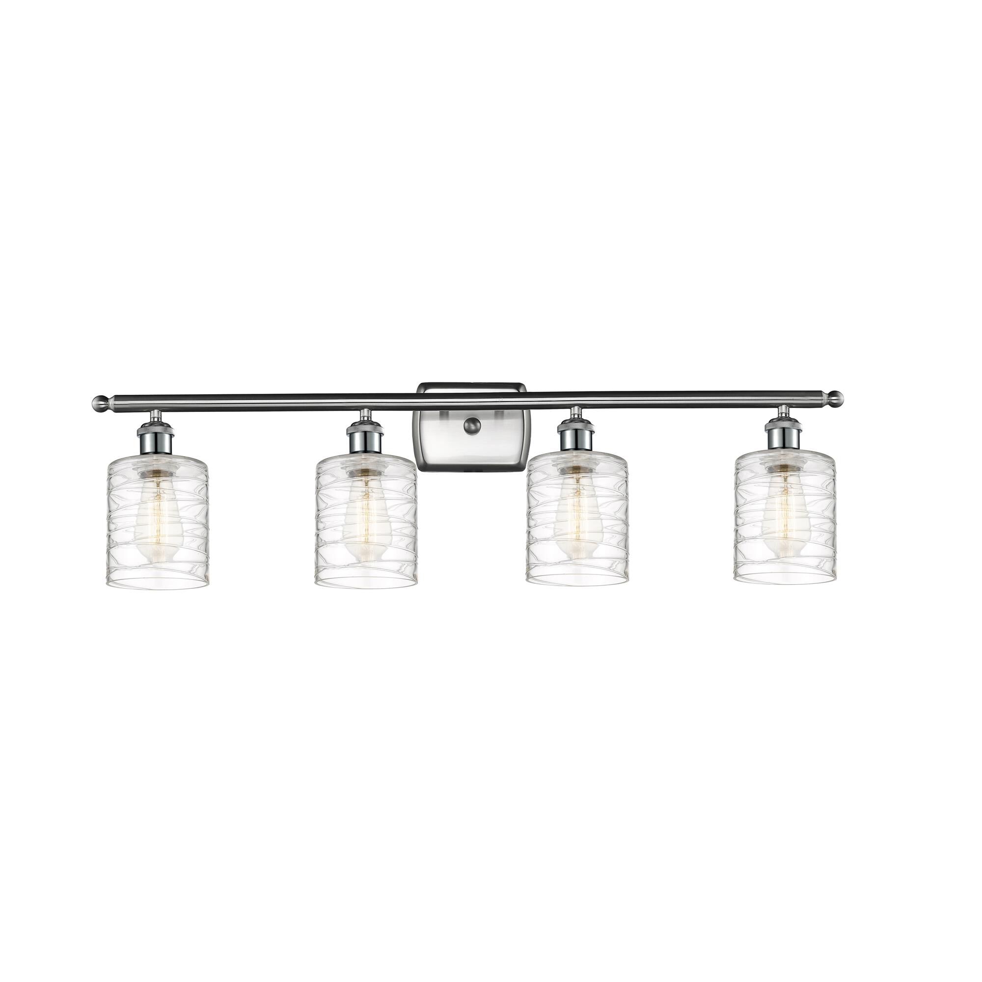 Shown in Brushed Satin Nickel finish and Deco Swirl Cobbleskill glass