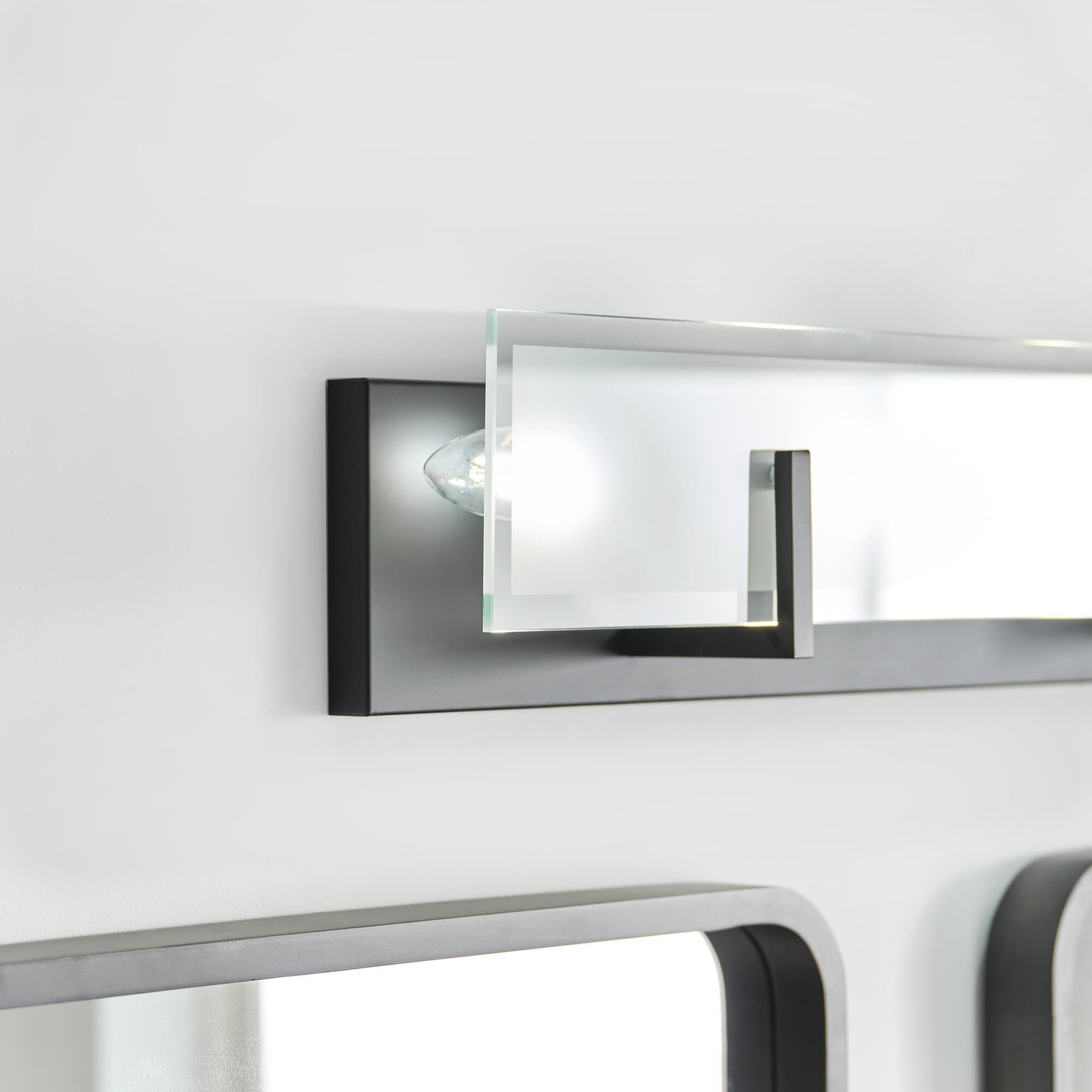 Shown in Midnight Black finish and Clear Highlighted Satin Etched glass