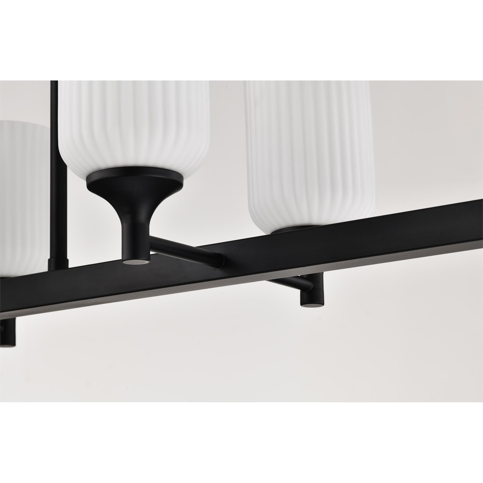 Shown in Matte Black finish and Frosted Ribbed glass