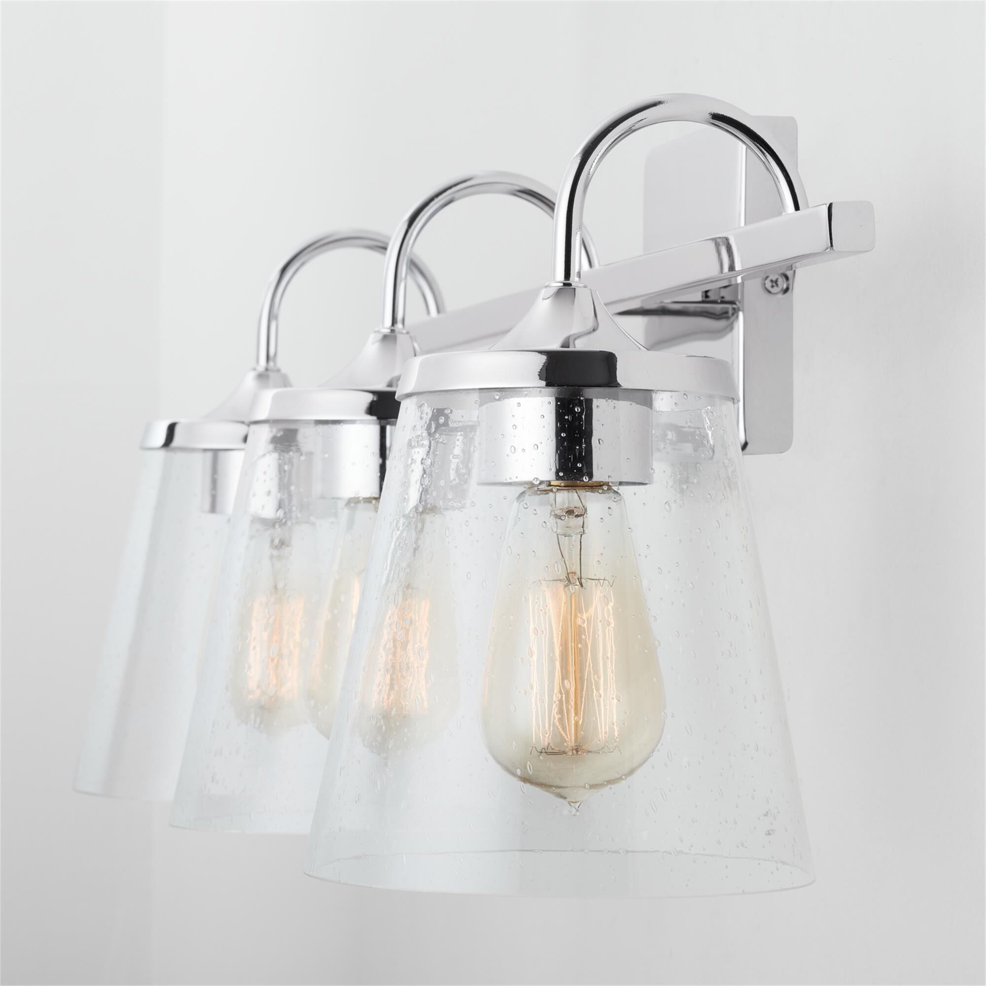 Shown in Chrome finish and Clear Seeded glass