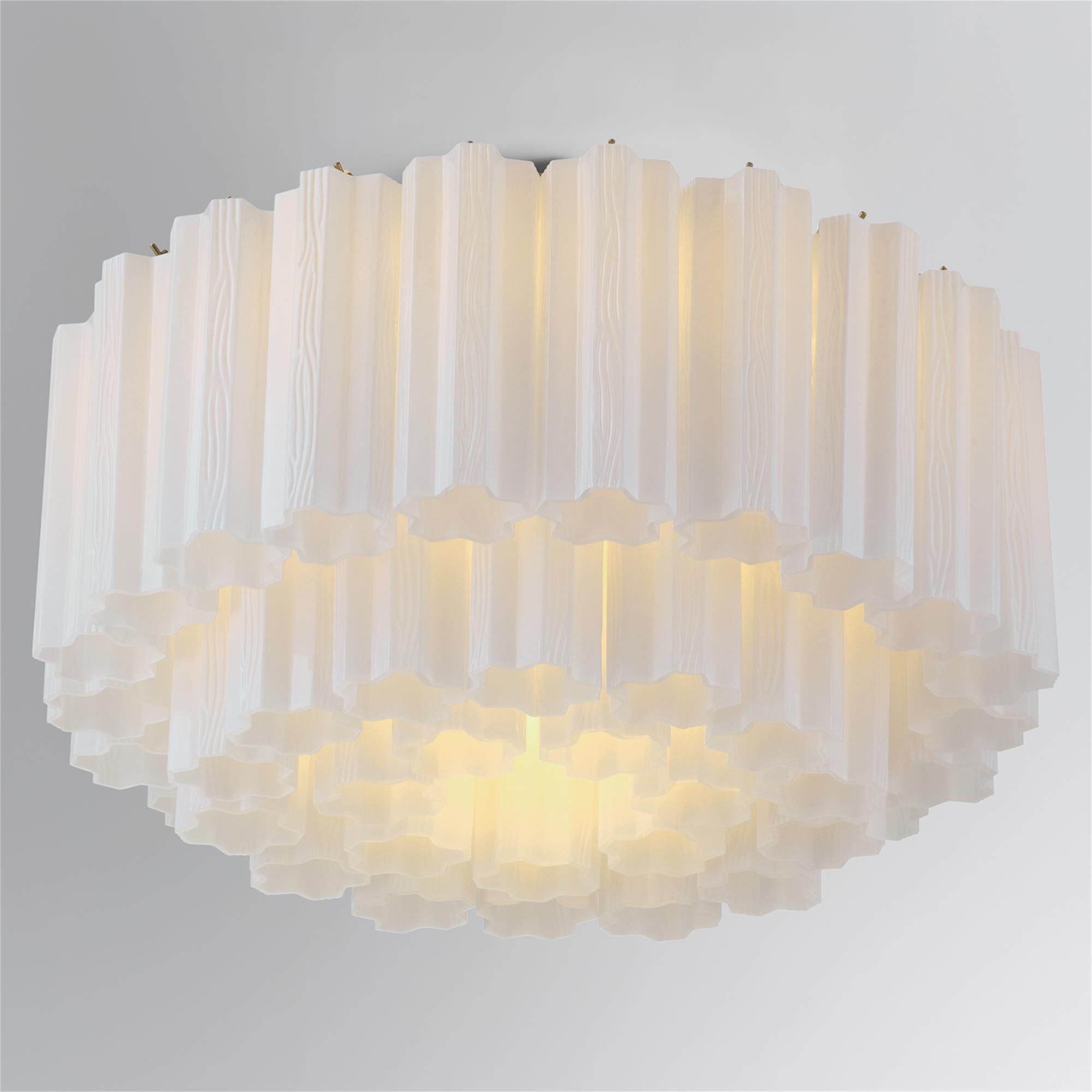 Shown in Aged Brass finish and Tronchi White glass