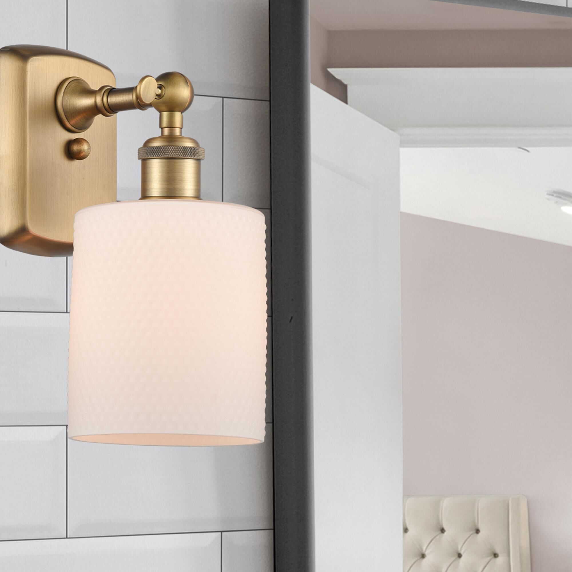 Shown in Brushed Brass finish and Drum glass and Glass shade