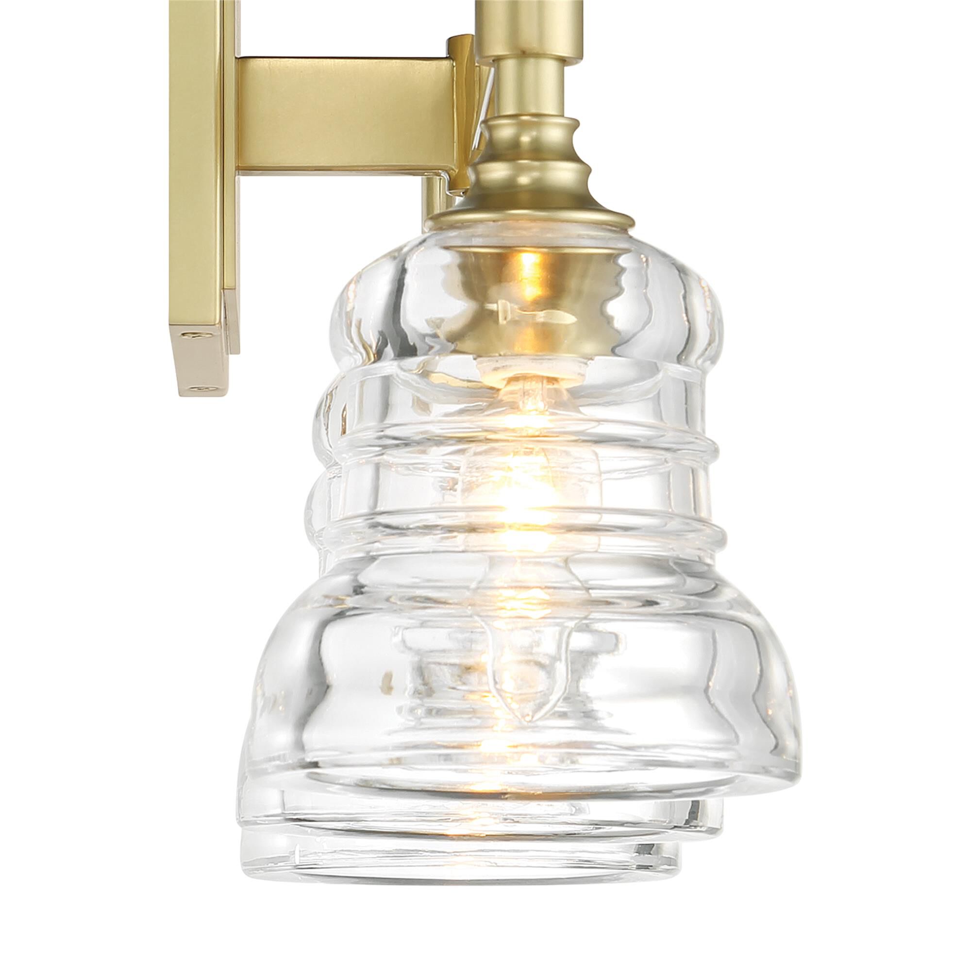 Shown in Aged Brass finish and Clear glass