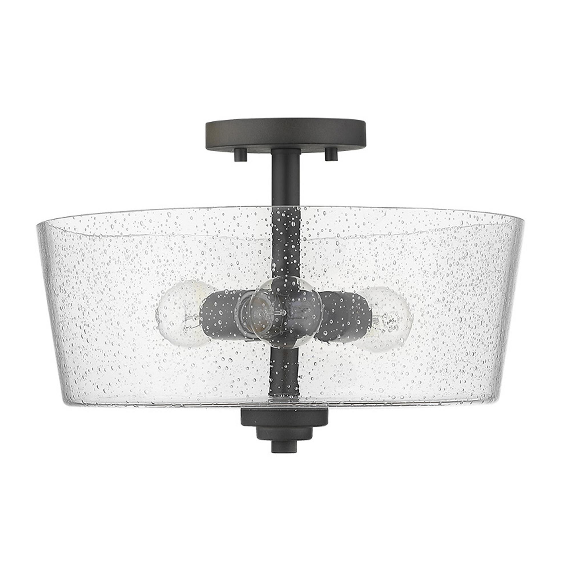 Shown in Oil-Rubbed Bronze finish and Clear glass and Clear, Seeded Drum Shaped Glass shade