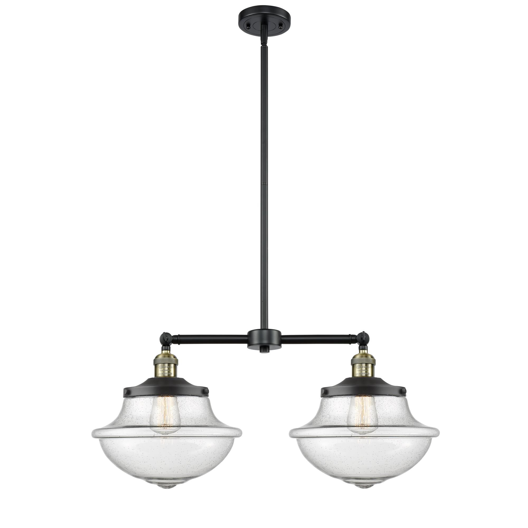 Shown in Black Antique Brass finish and Seedy glass