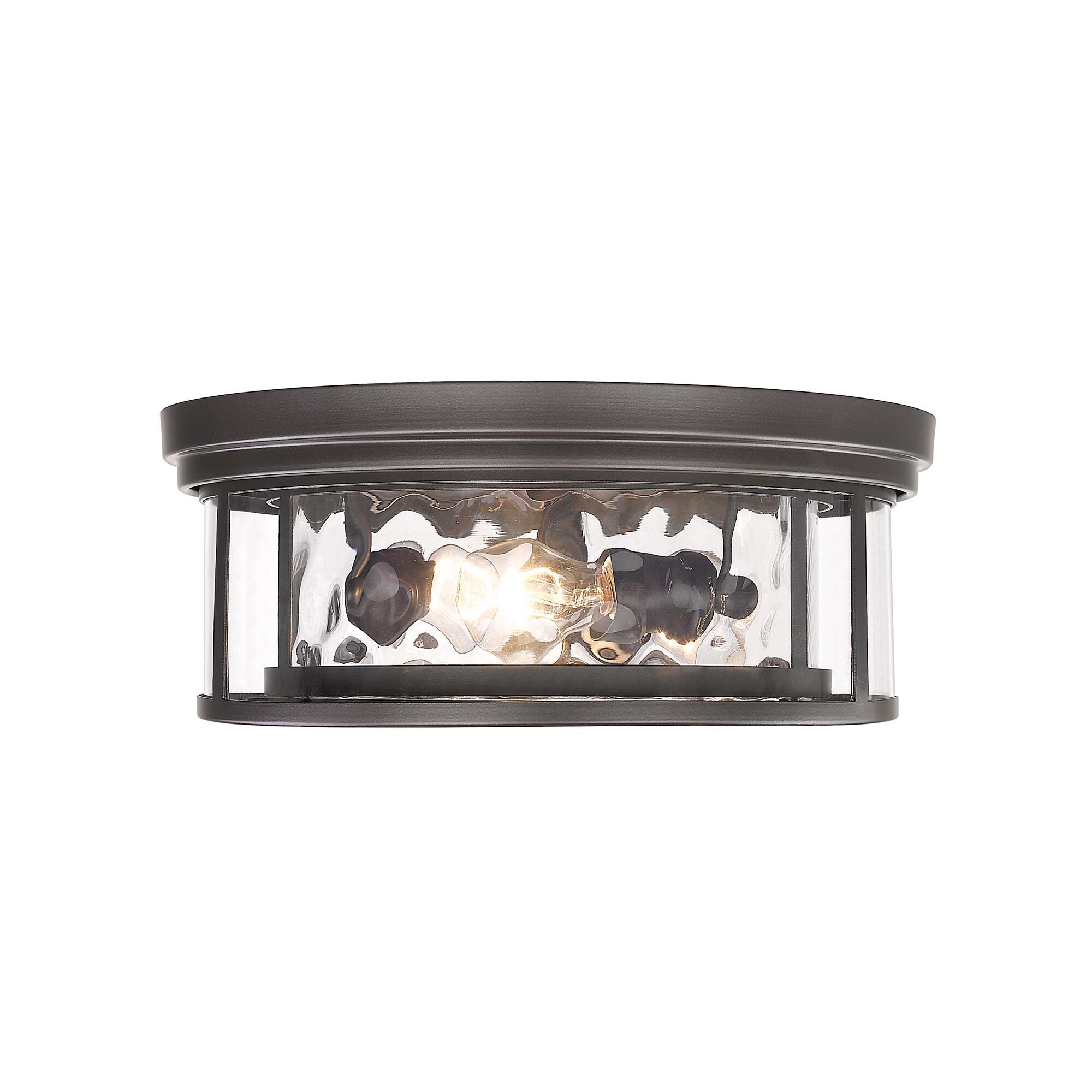 Shown in Bronze finish and Glass shade