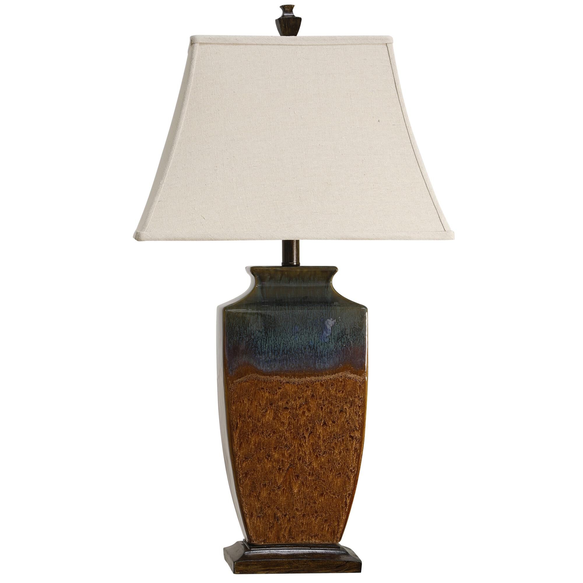 Shown in Brown And Turquoise finish and Cream Softback Fabric shade