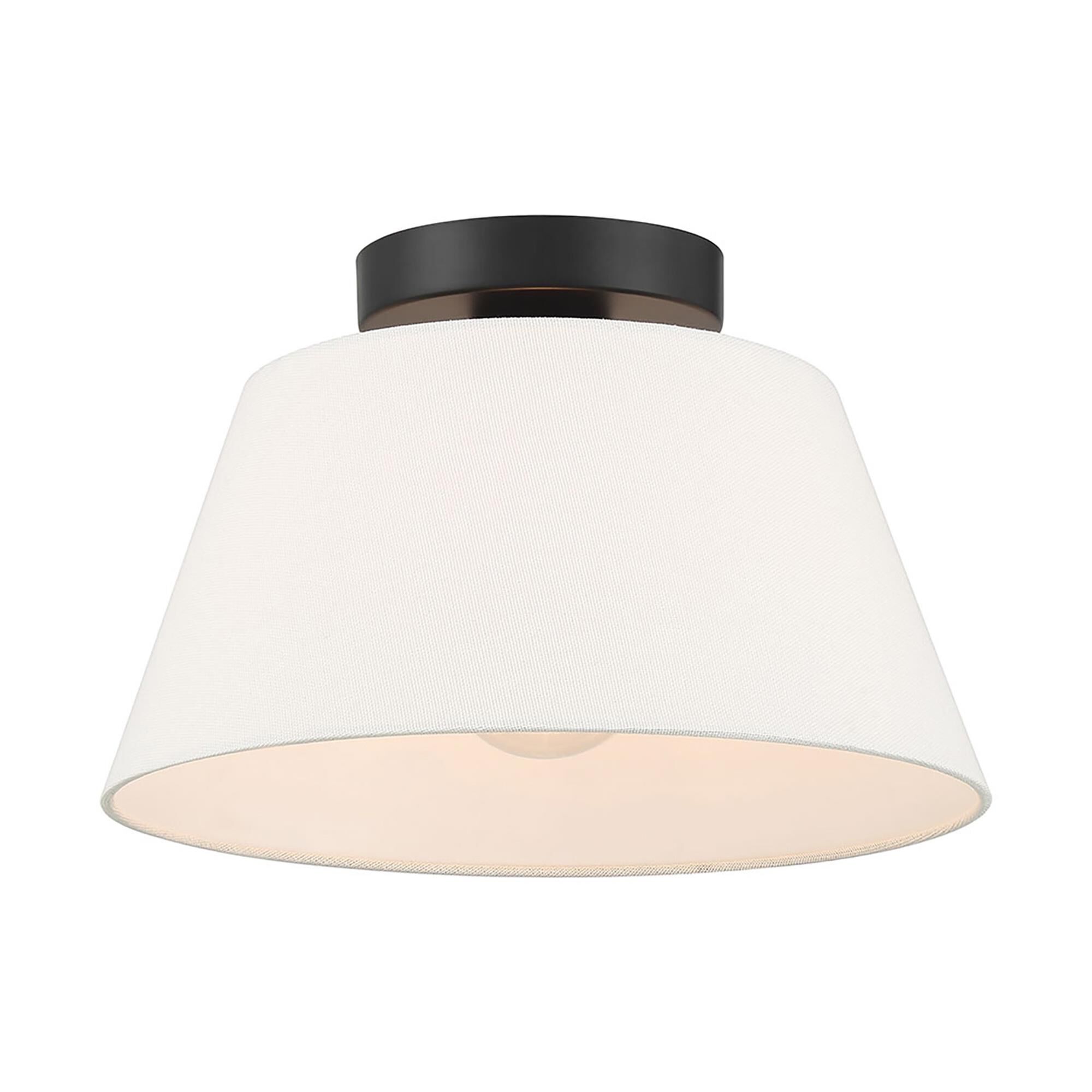 Shown in Matte Black finish and White Linen Fabric shade