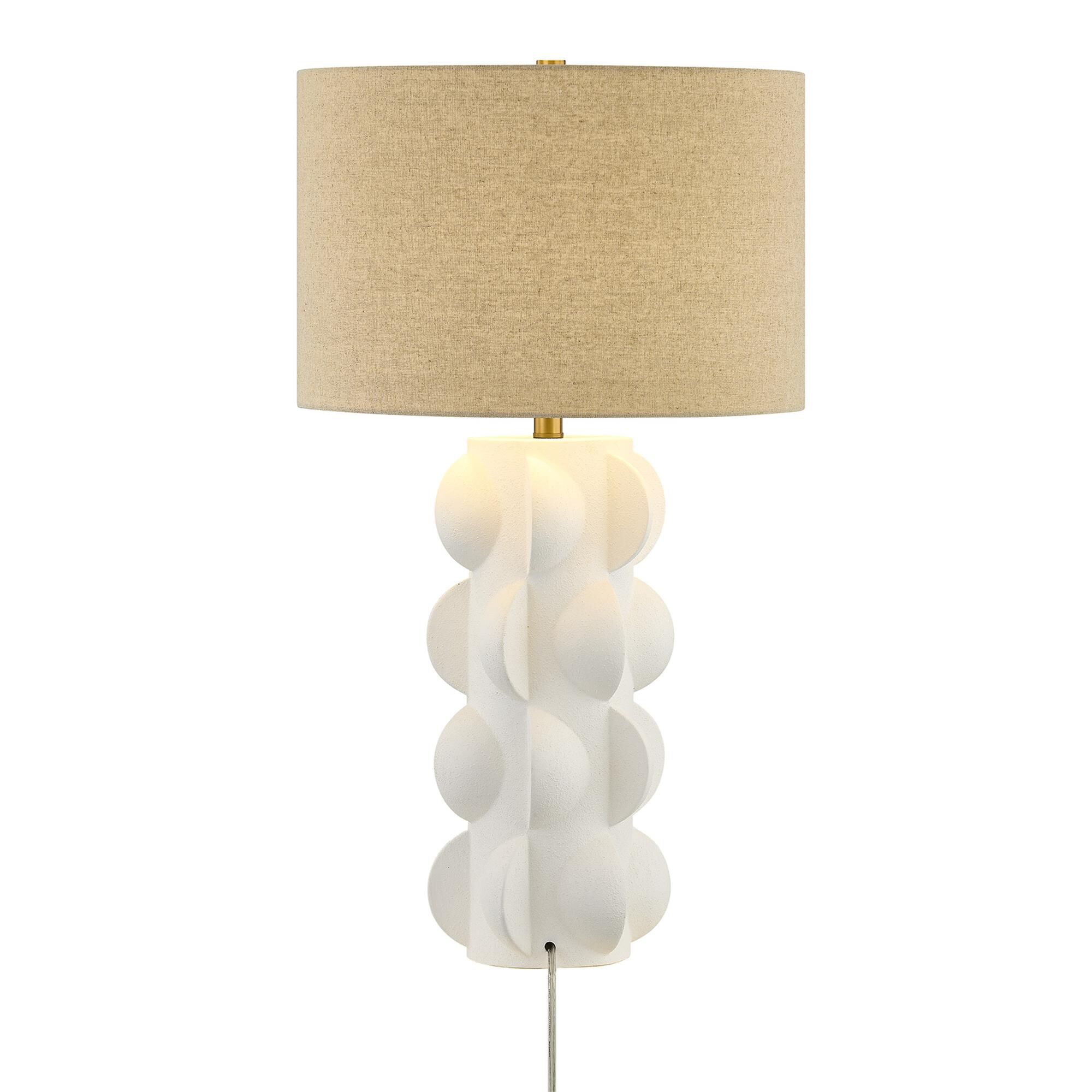 Shown in Warm Brass finish and Beige Fabric shade