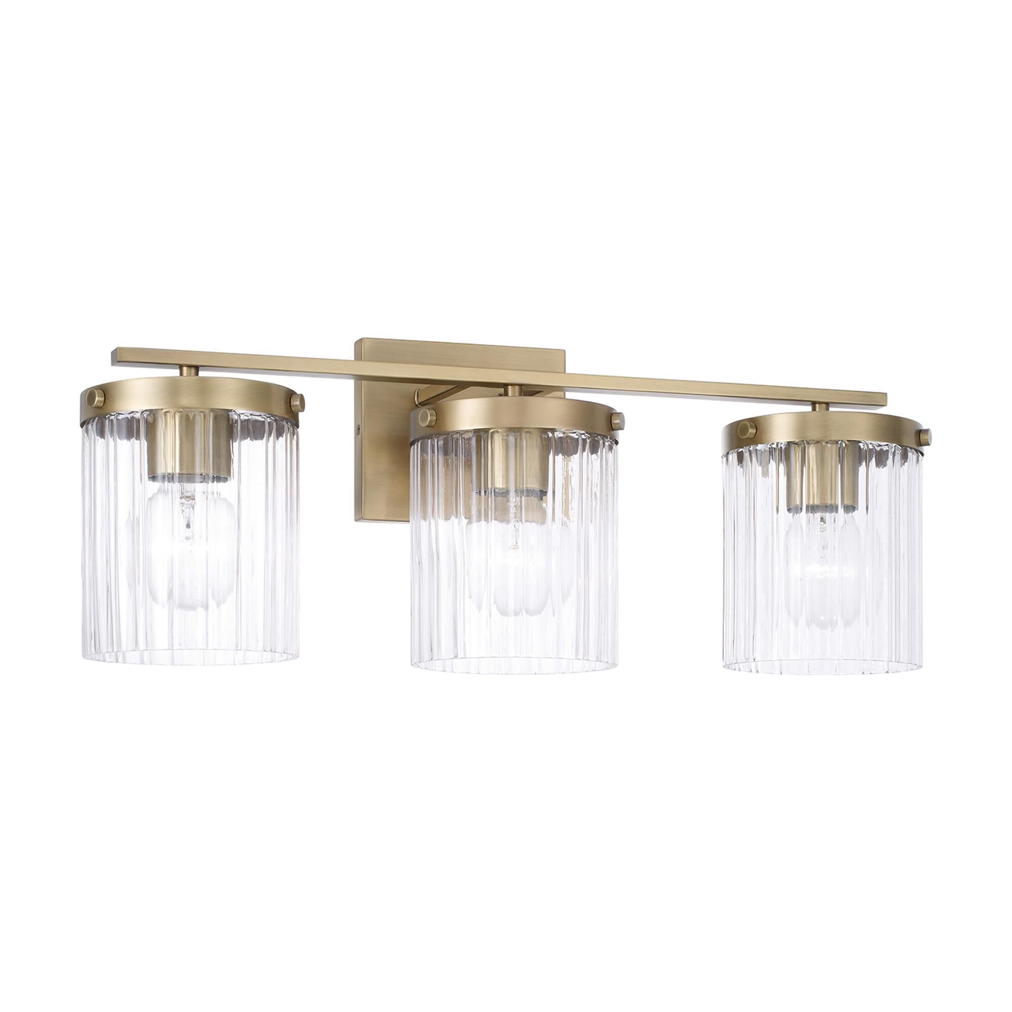 Shown in Aged Brass finish and Beveled Fluted glass