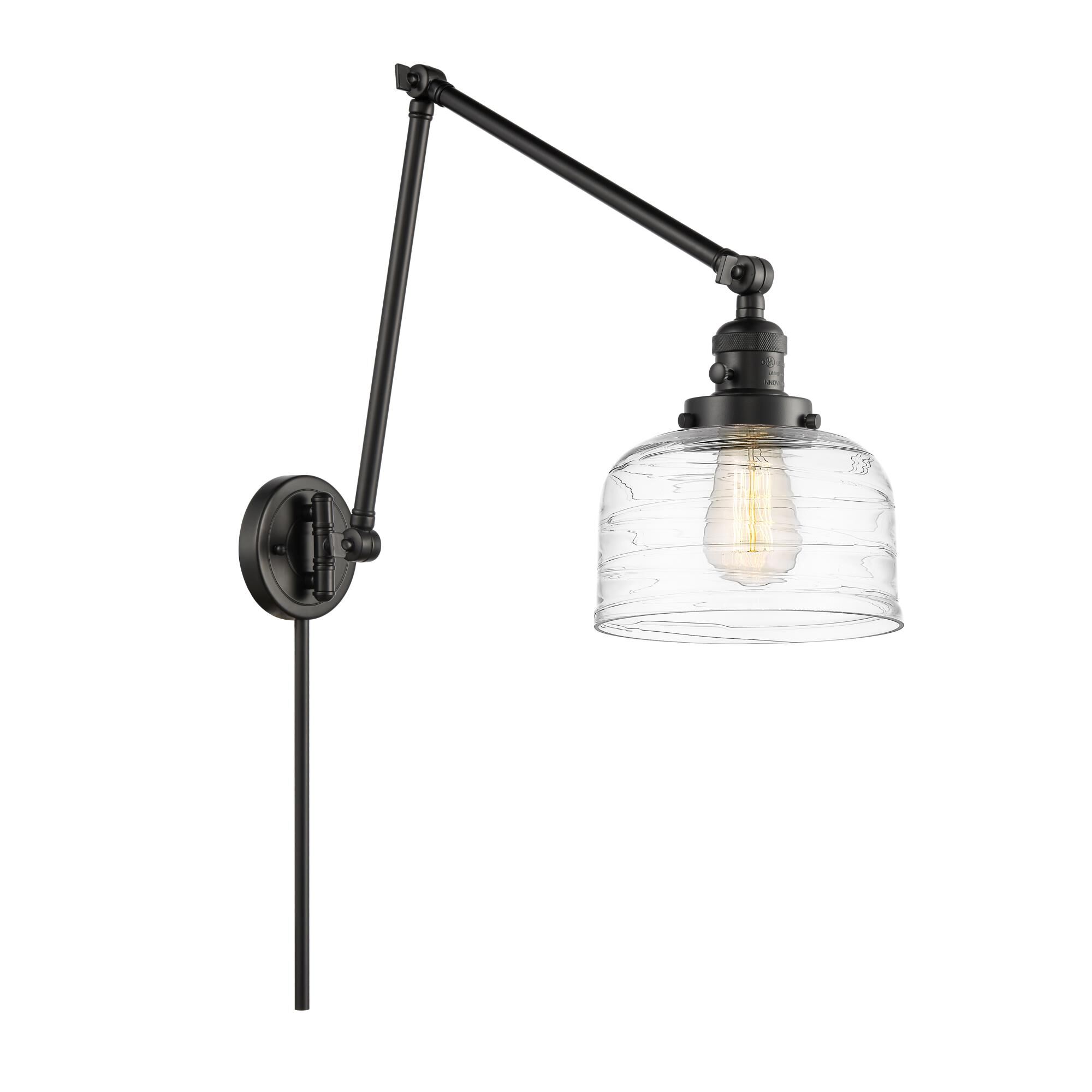 Shown in Matte Black finish and Clear Deco Swirl Large Bell glass