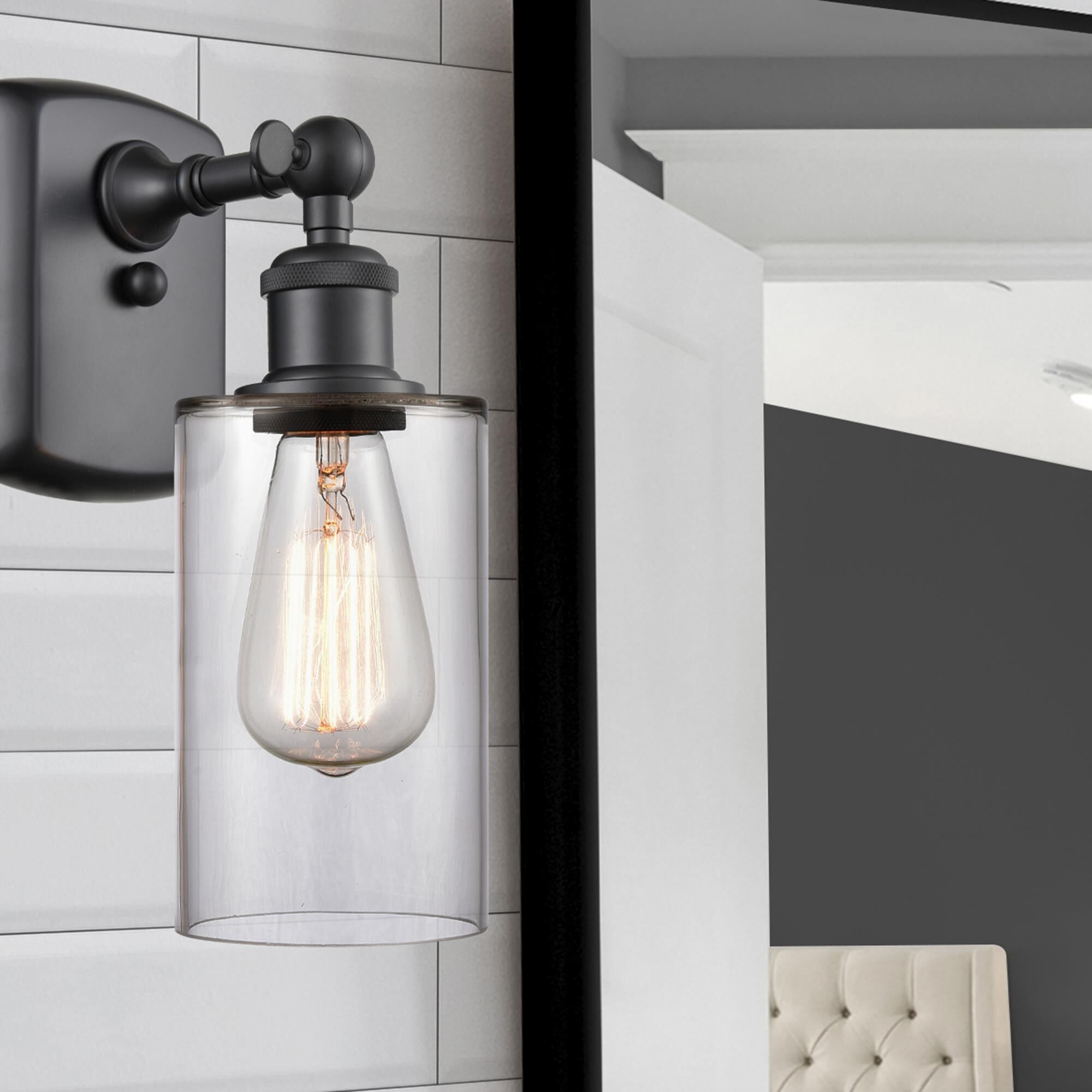 Shown in Matte Black finish and Drum glass and Glass shade and Polished Chrome accent