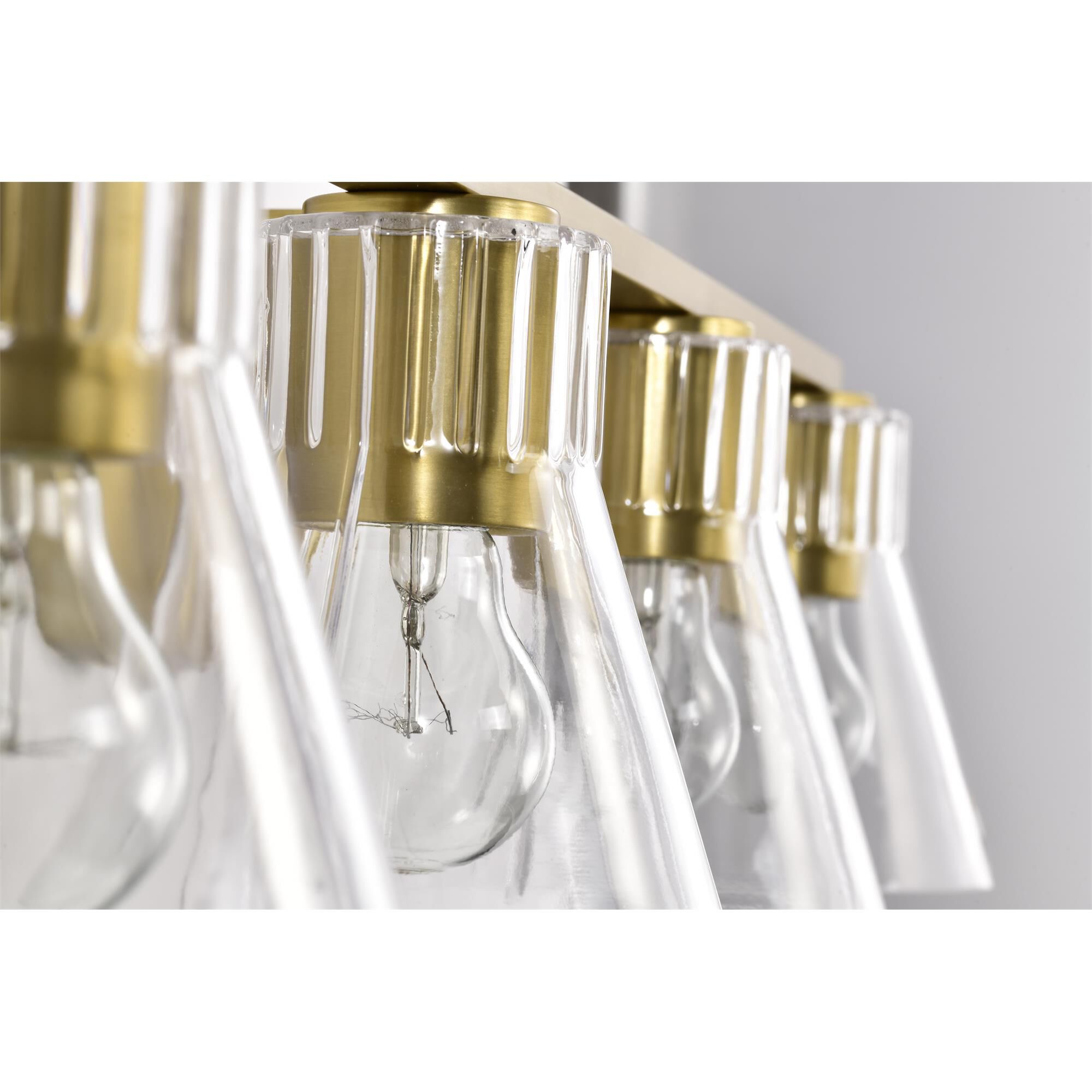 Shown in Vintage Brass finish and Clear glass