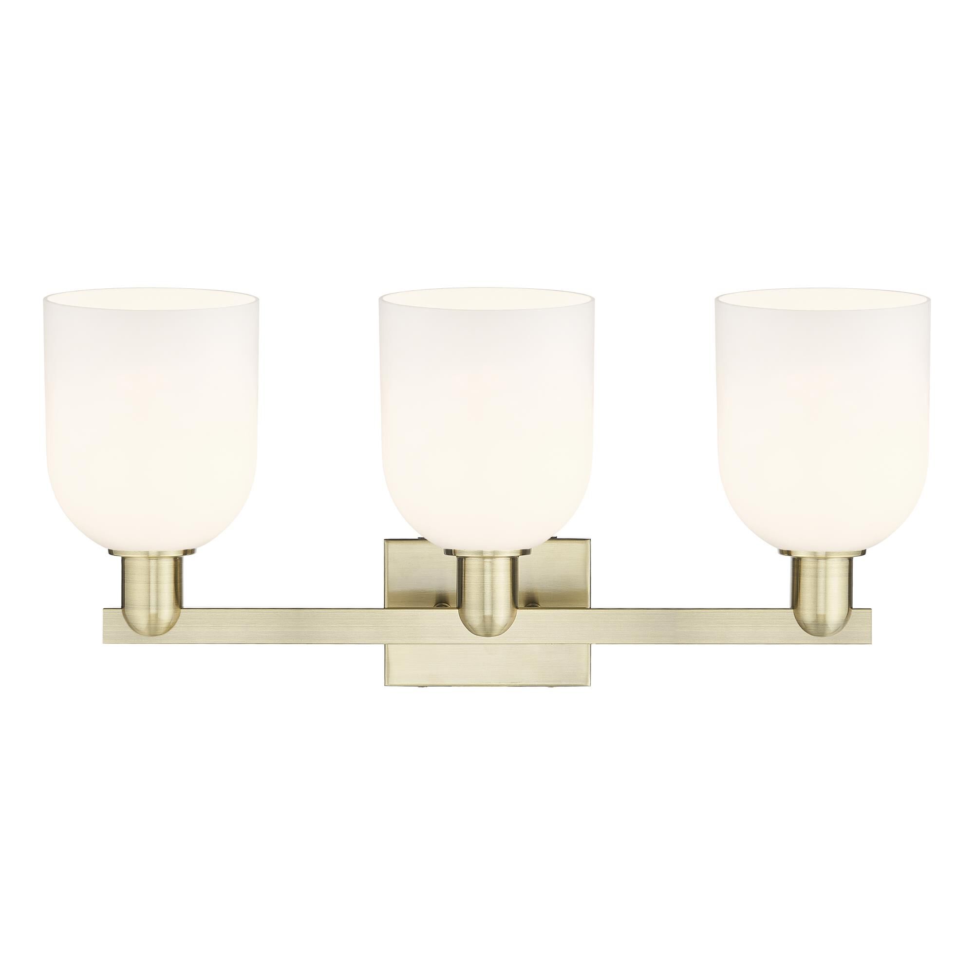 Shown in Antique Brass finish and White glass