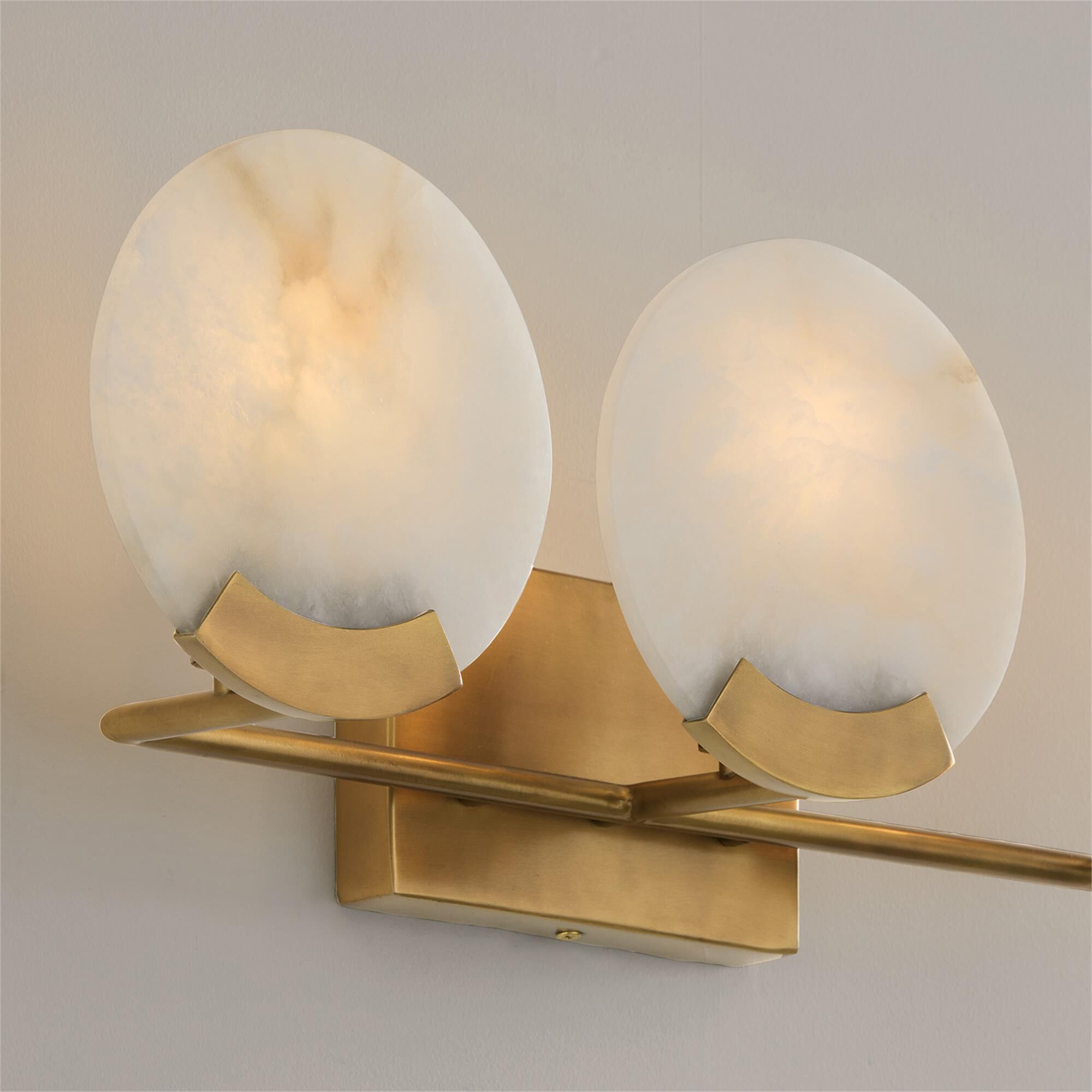 Shown in Aged Brass finish and Natural Alabaster Stone glass