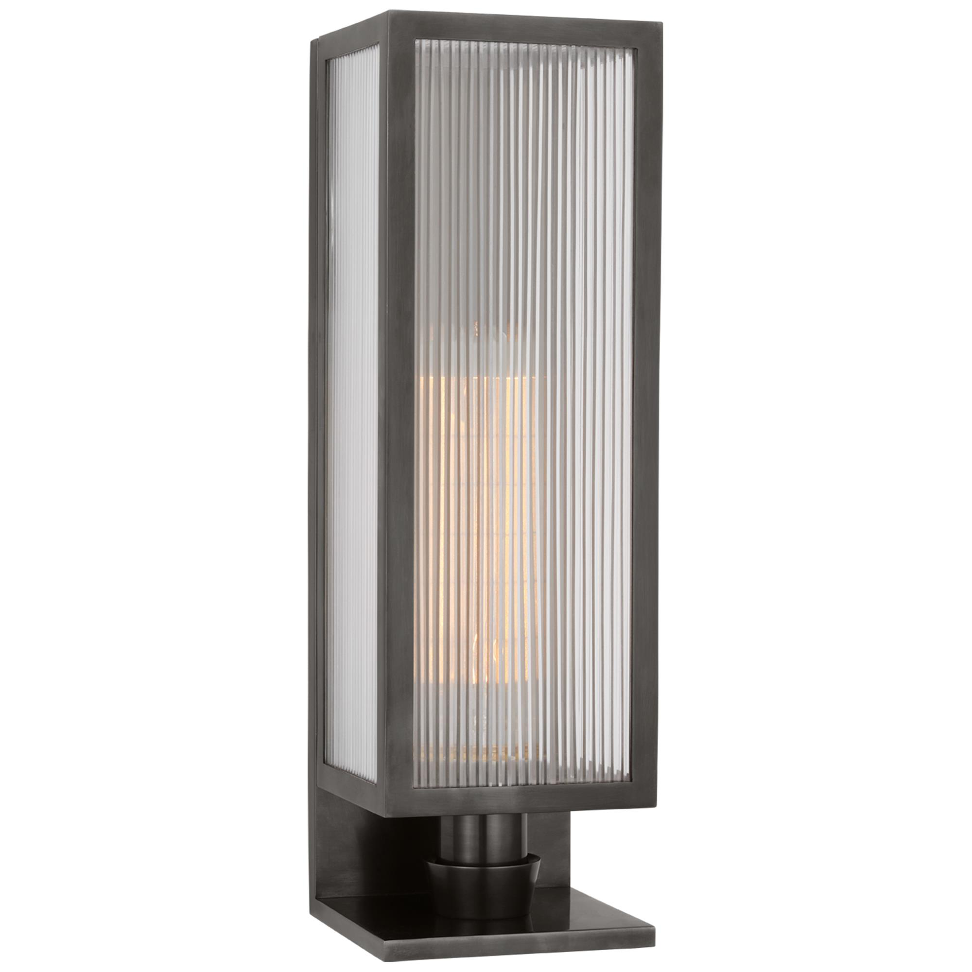 Shown in Bronze finish and Clear Ribbed glass
