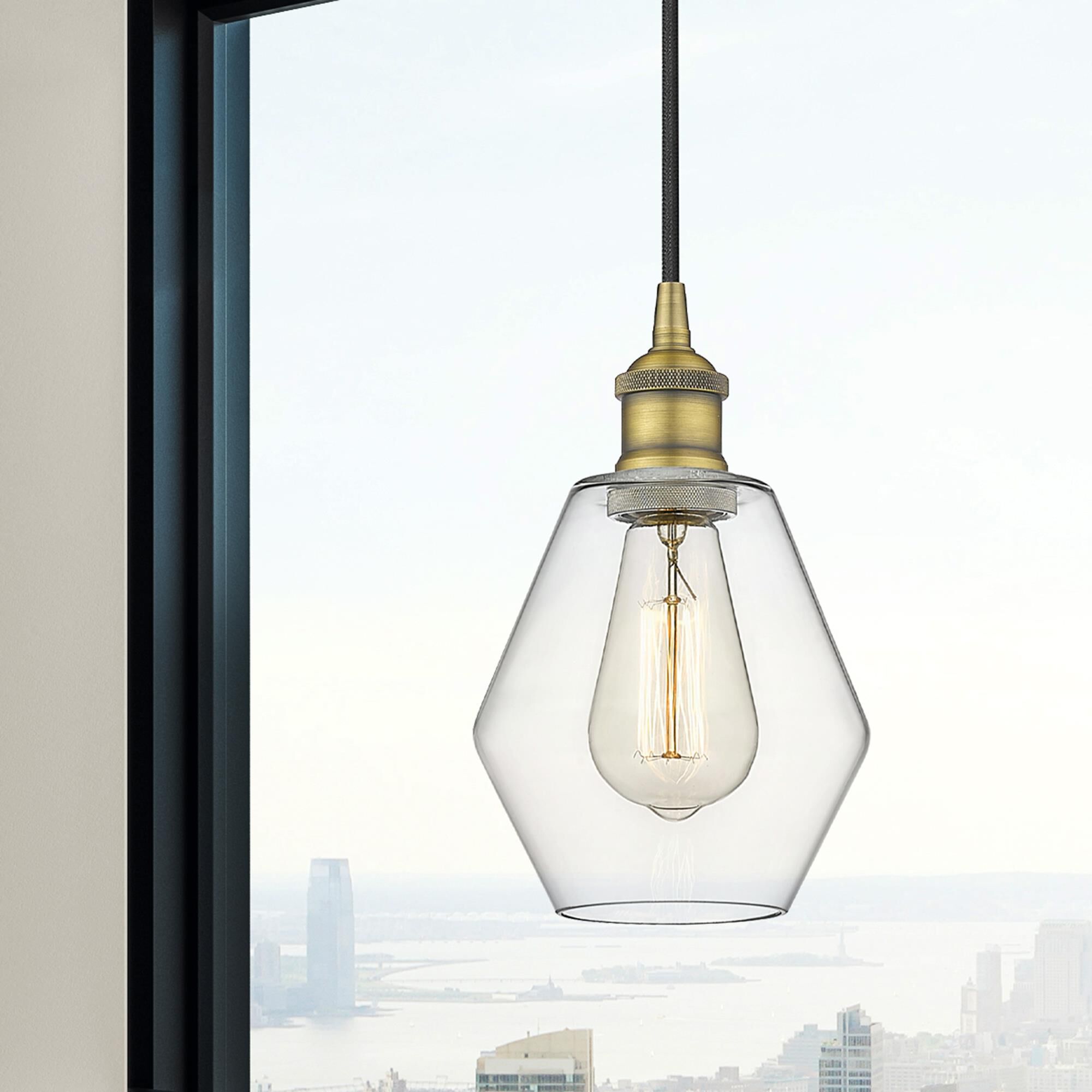Shown in Brushed Brass finish and Clear glass