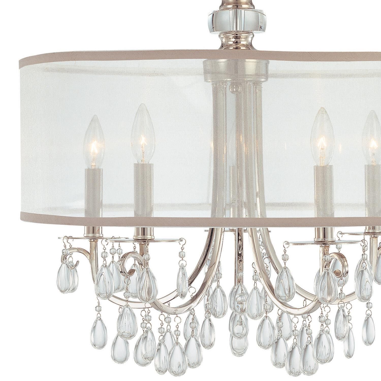 Shown in Polished Chrome finish and Clear Teardrop Almond crystal and Silk glass and Silk shade