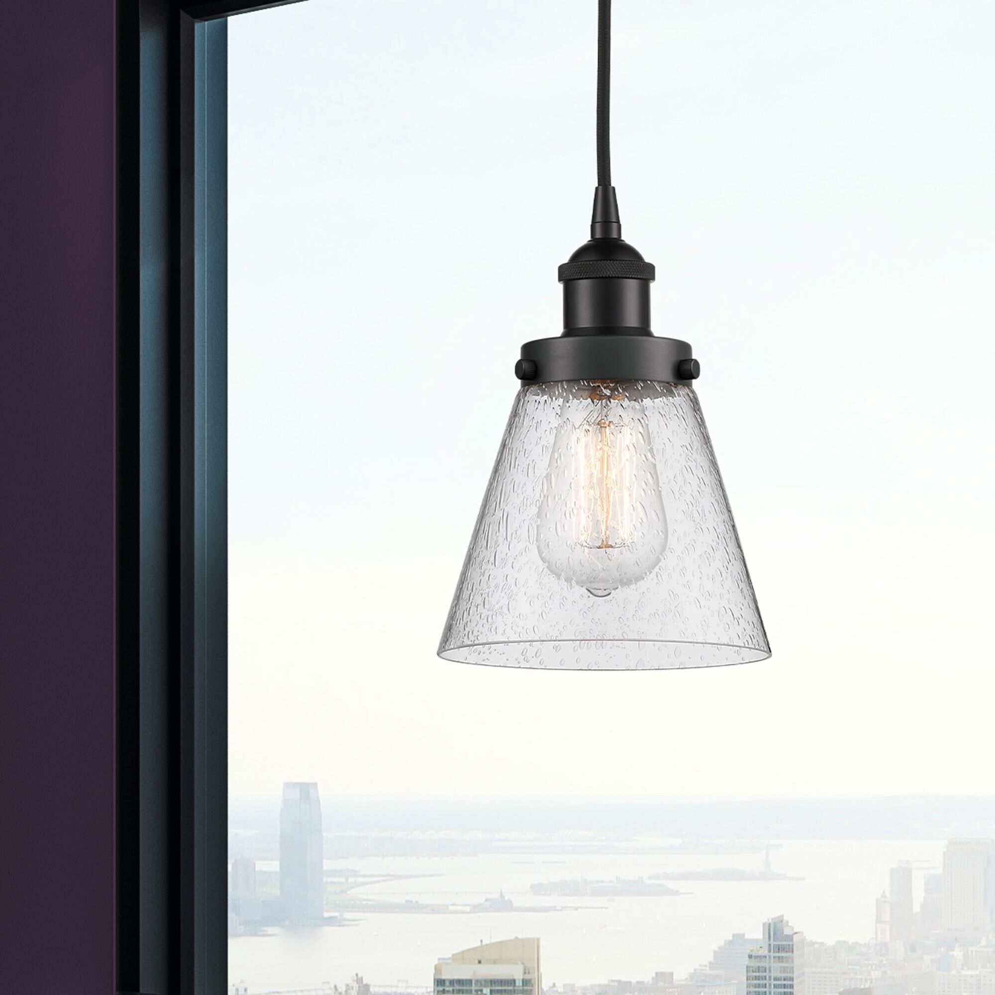 Shown in Matte Black finish and Seedy Small Cone glass