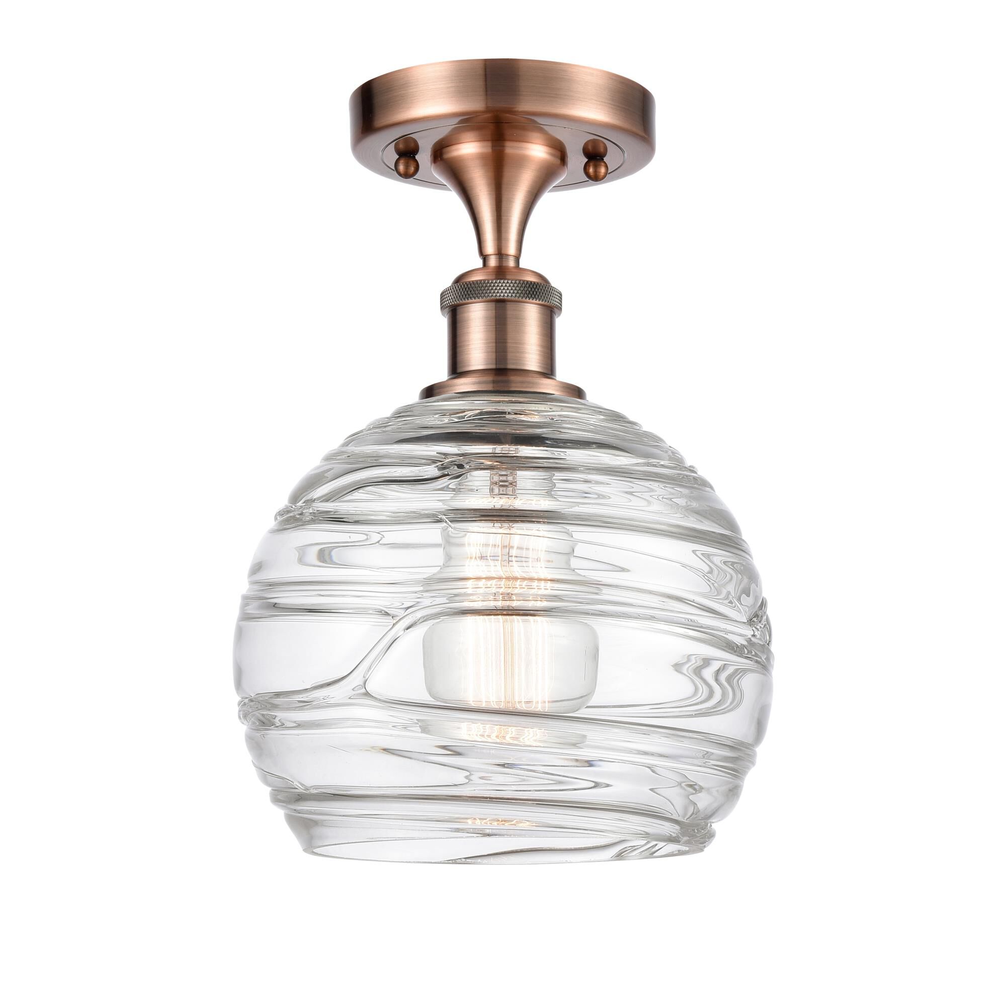 Shown in Antique Copper finish and Sphere glass and Glass shade