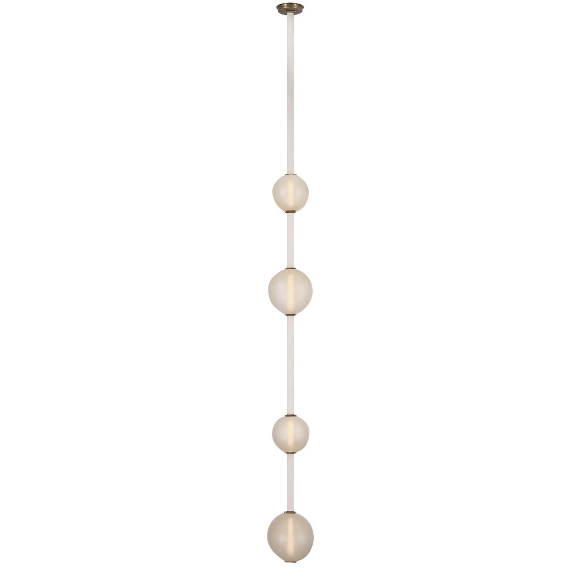 Shown in Bone Suede And Mottled Brass finish and Fizzy Nude glass