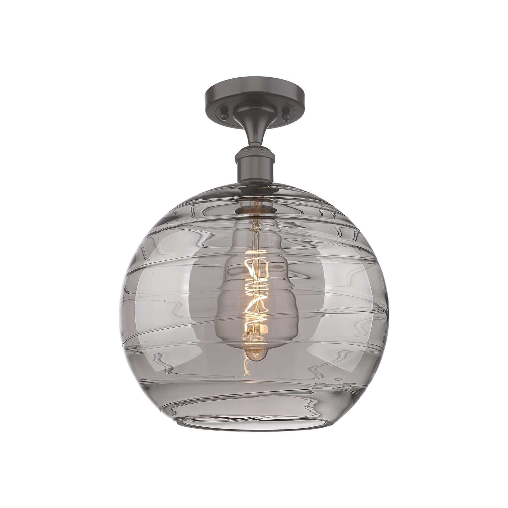 Shown in Oil Rubbed Bronze finish and Light Smoke Deco Swirl glass