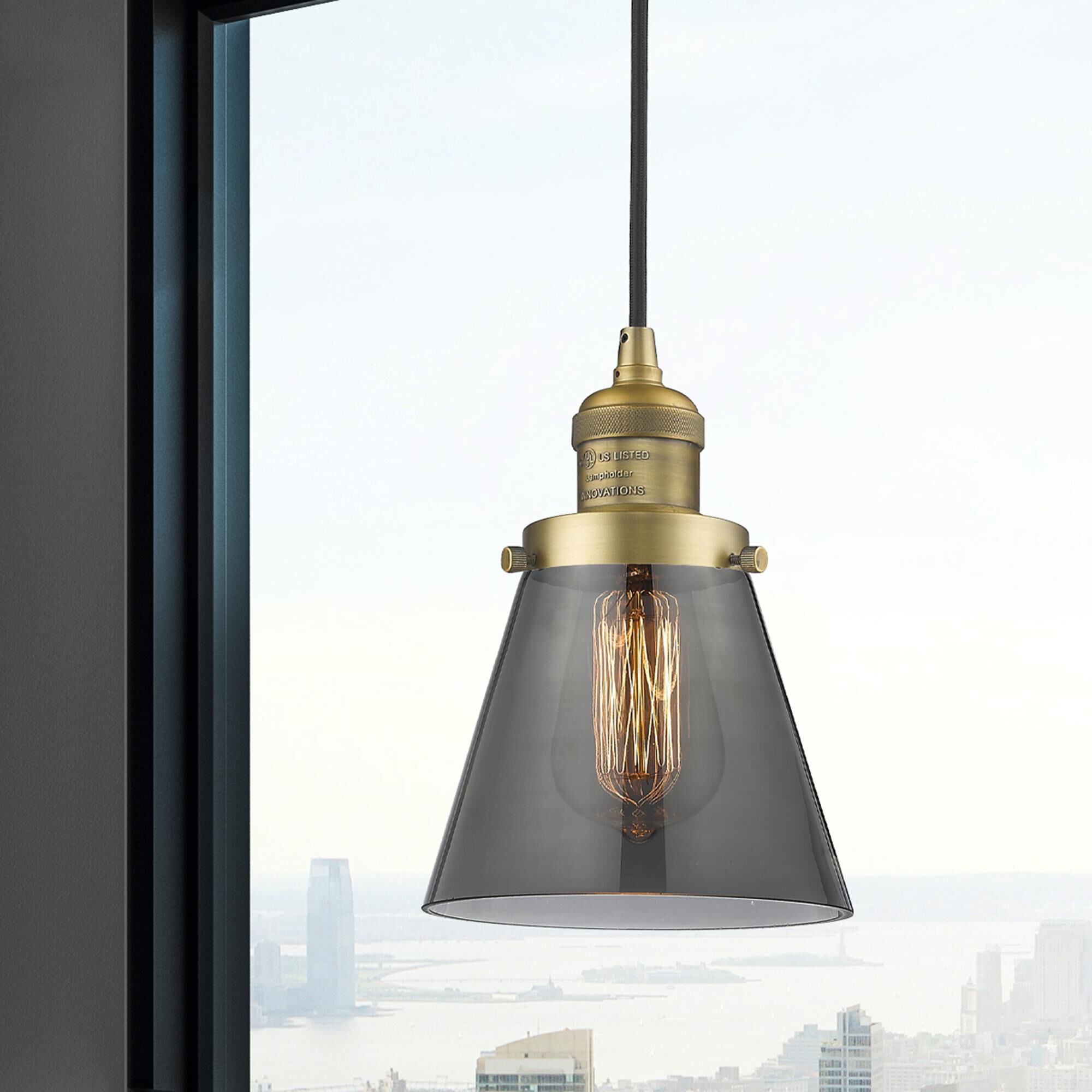 Shown in Brushed Brass finish and Smoked glass