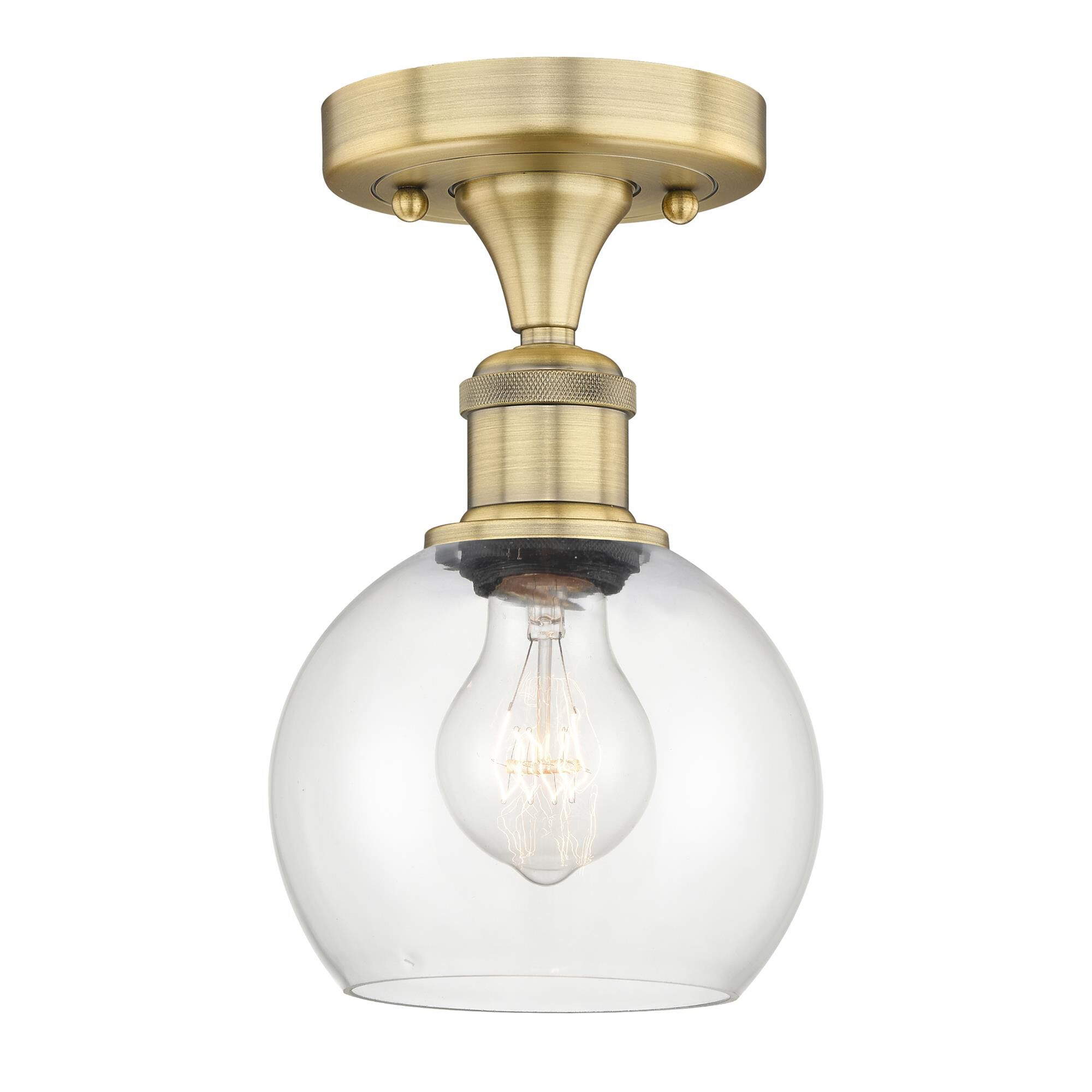 Shown in Brushed Brass finish and Clear glass