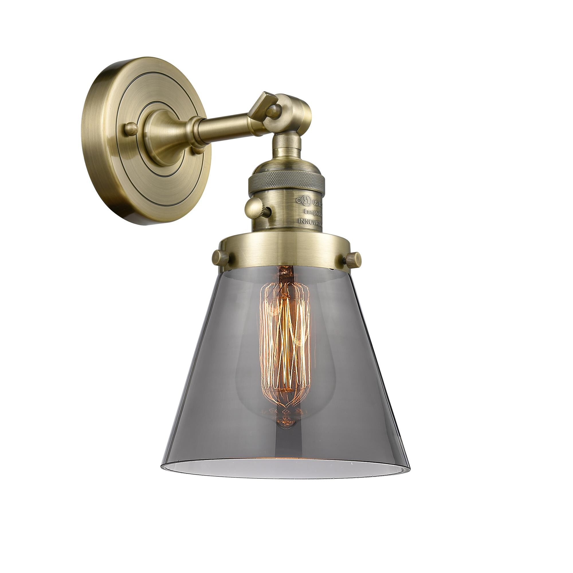 Shown in Antique Brass finish and Smoked glass