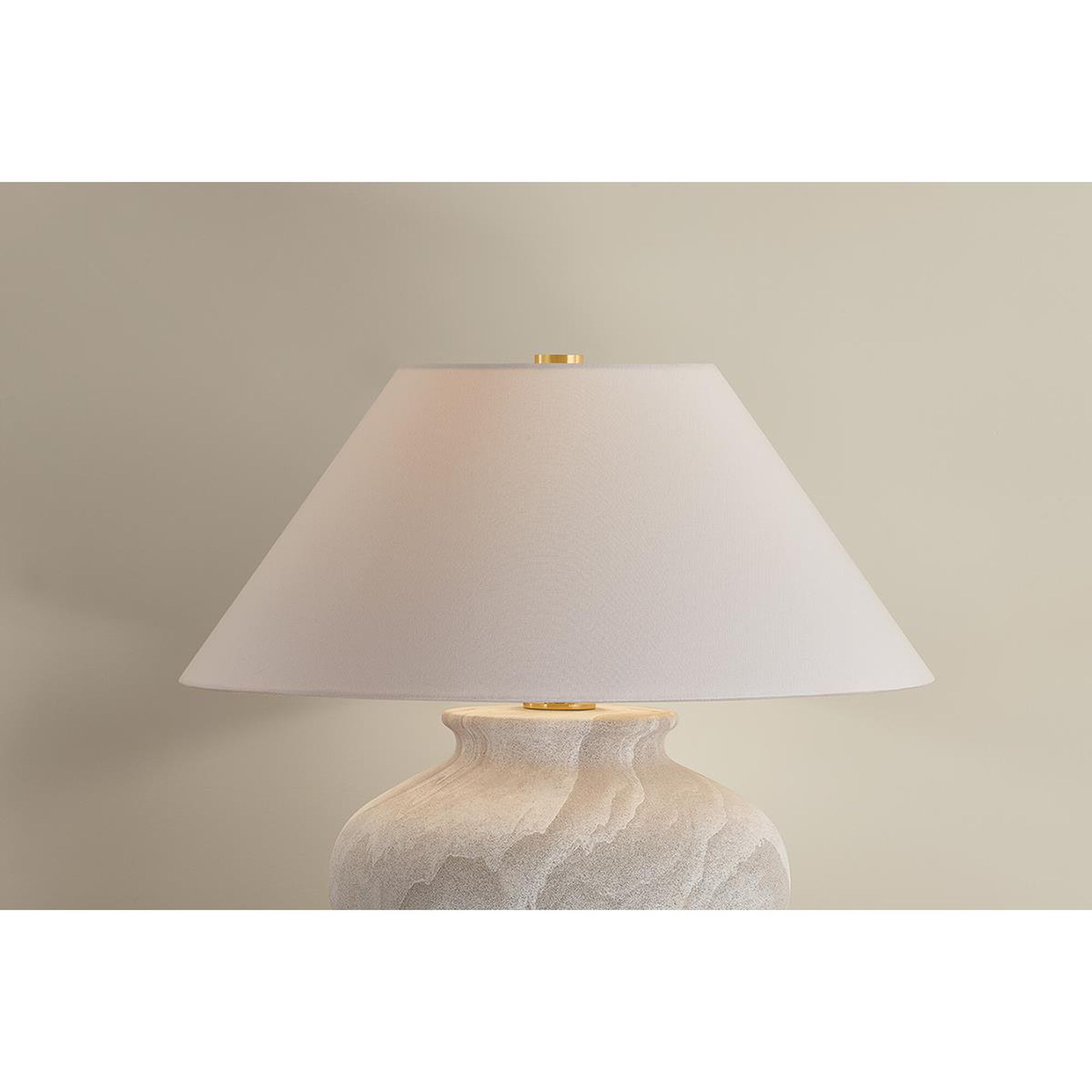 Shown in Aged Brass and Ceramic Watercolor Sand finish and White Linen shade