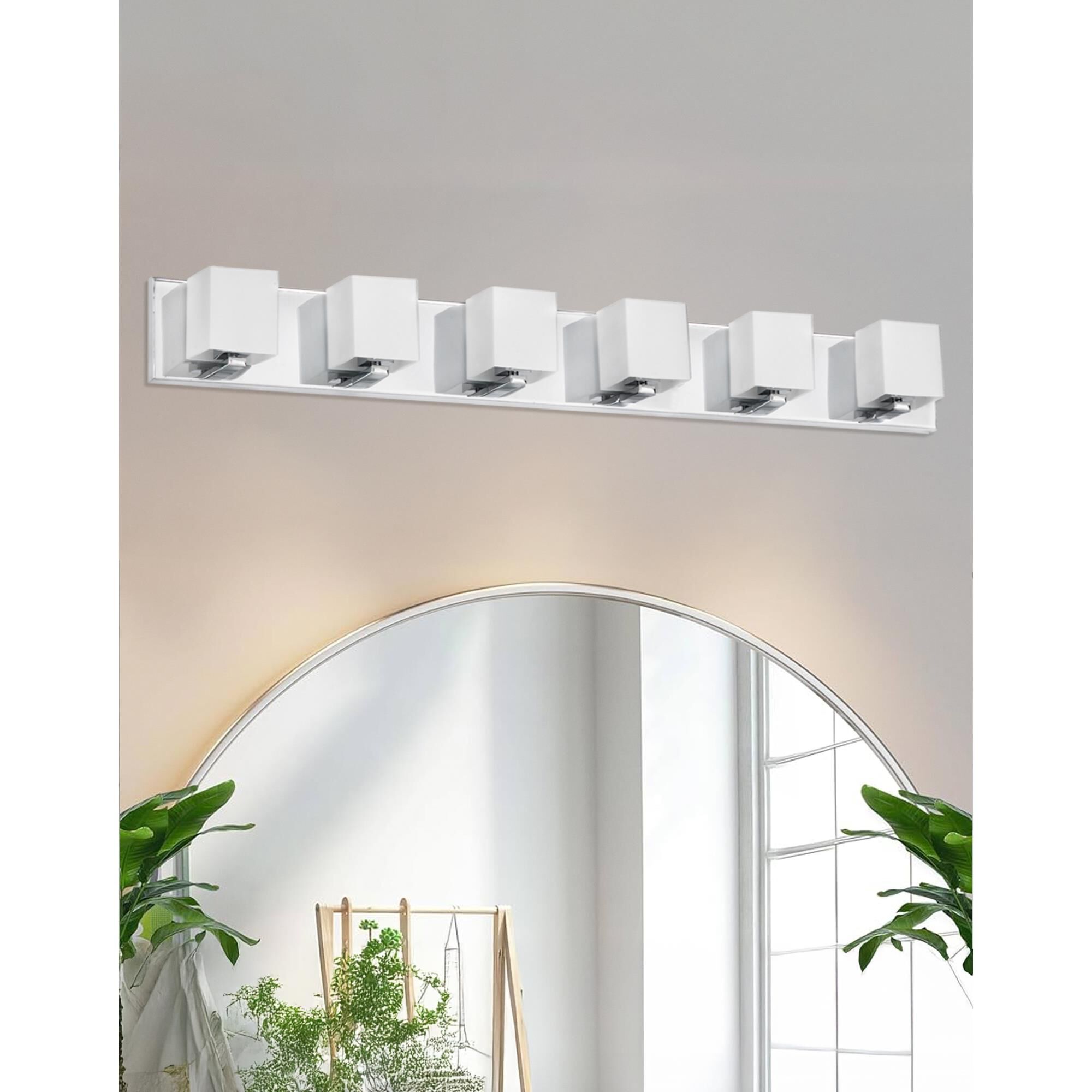 Shown in Polished Chrome and Frosted finish and White Square glass and Aged Brass accent