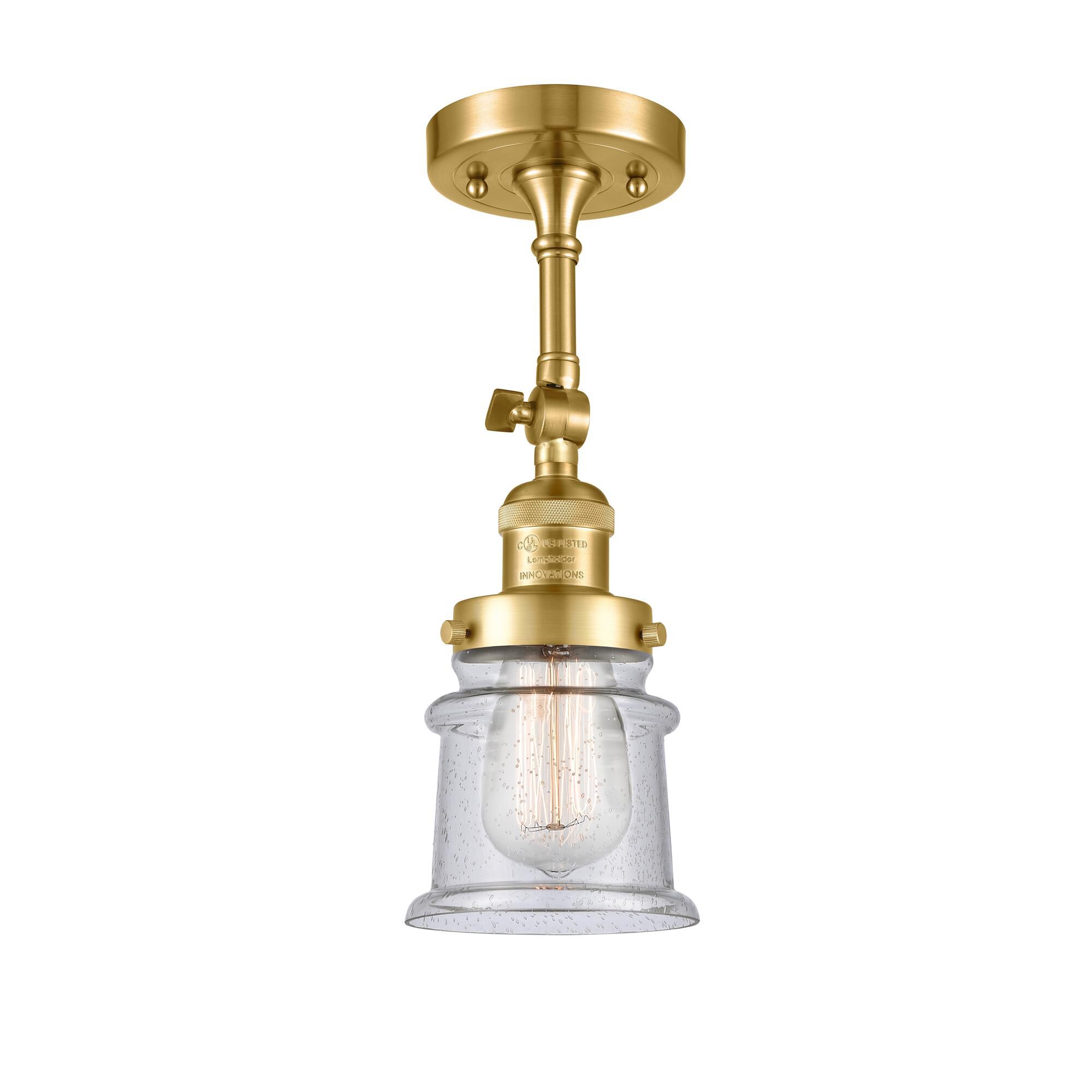 Shown in Satin Gold finish and Seedy glass and None accent