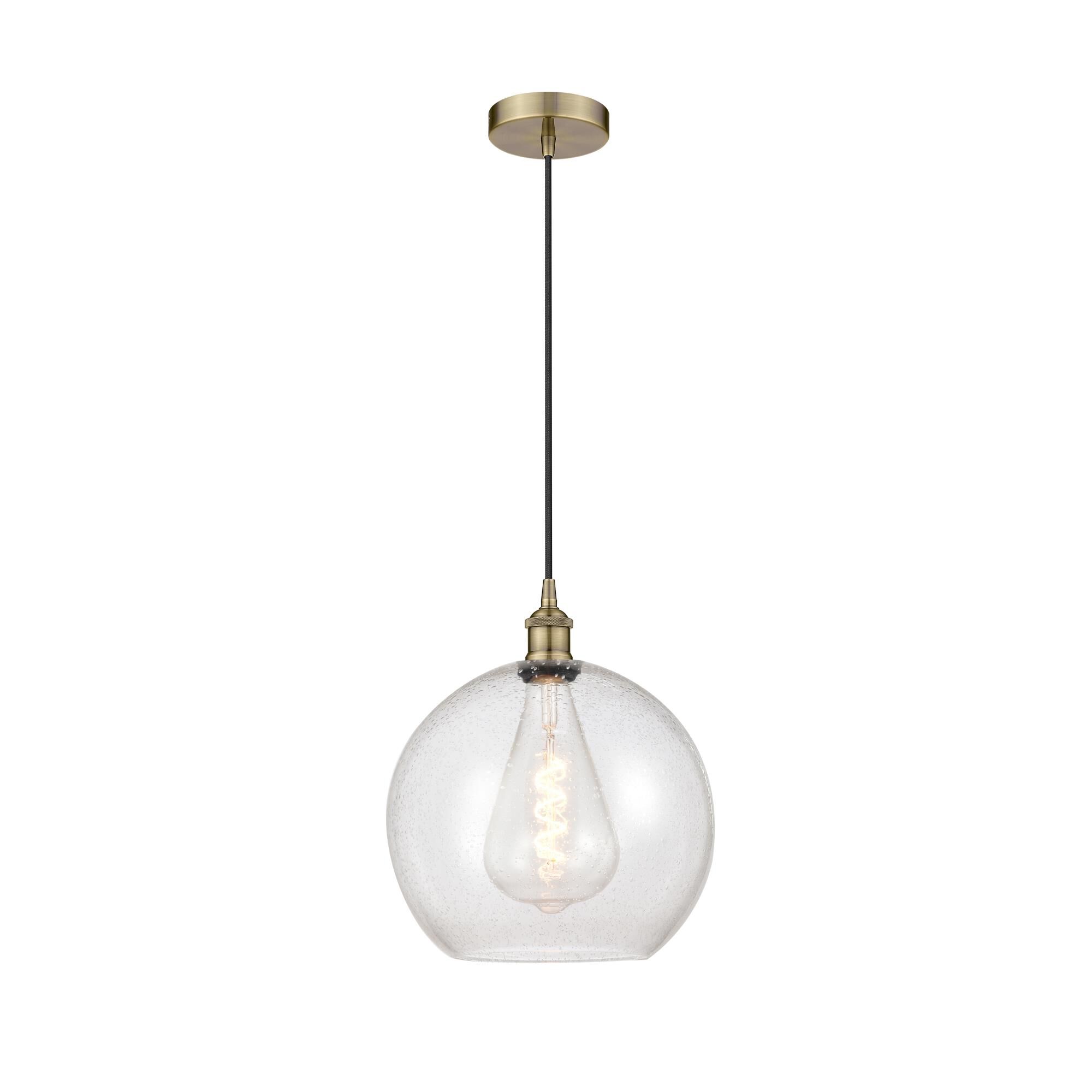 Shown in Antique Brass finish and Seedy Large Athens glass