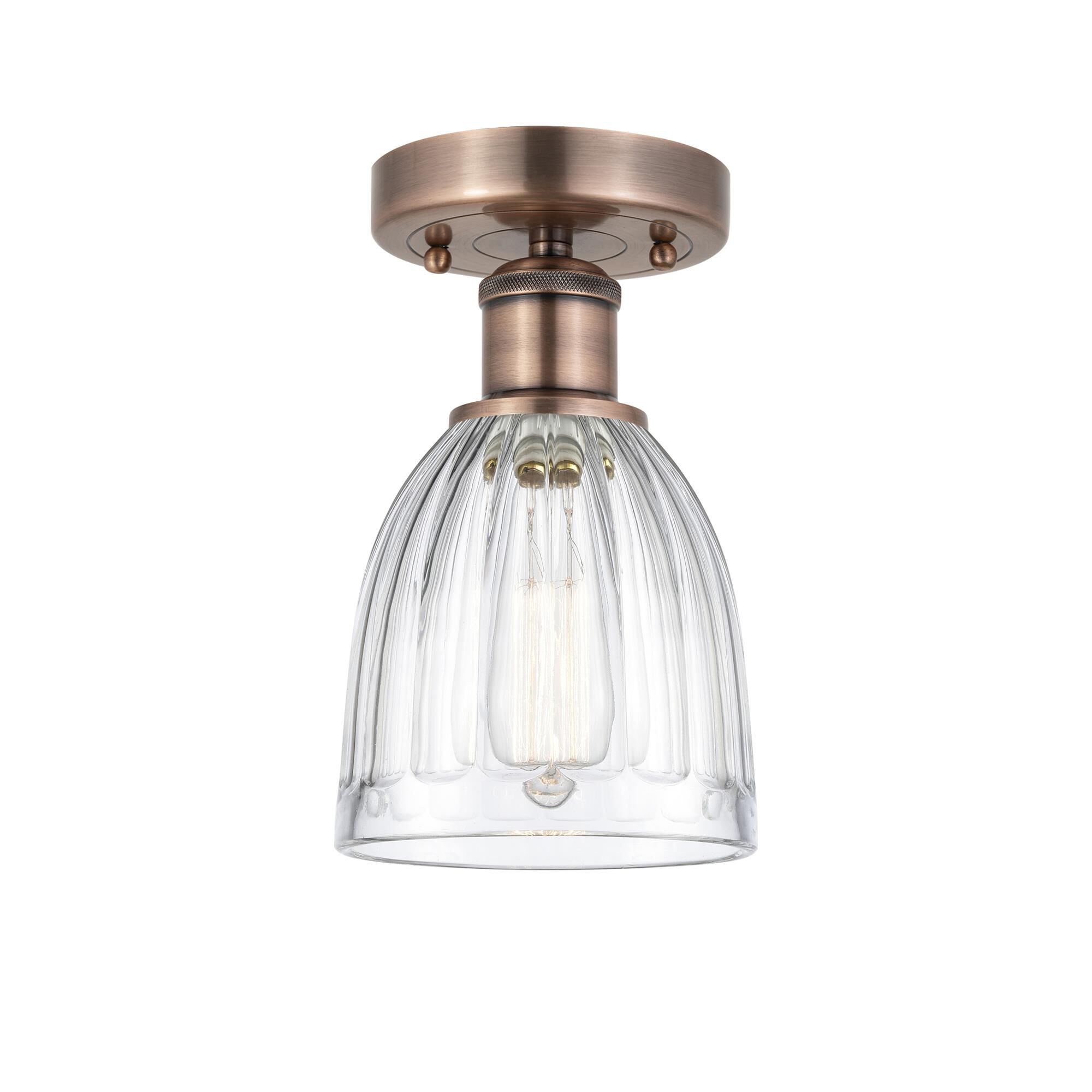 Shown in Antique Copper finish and Clear glass