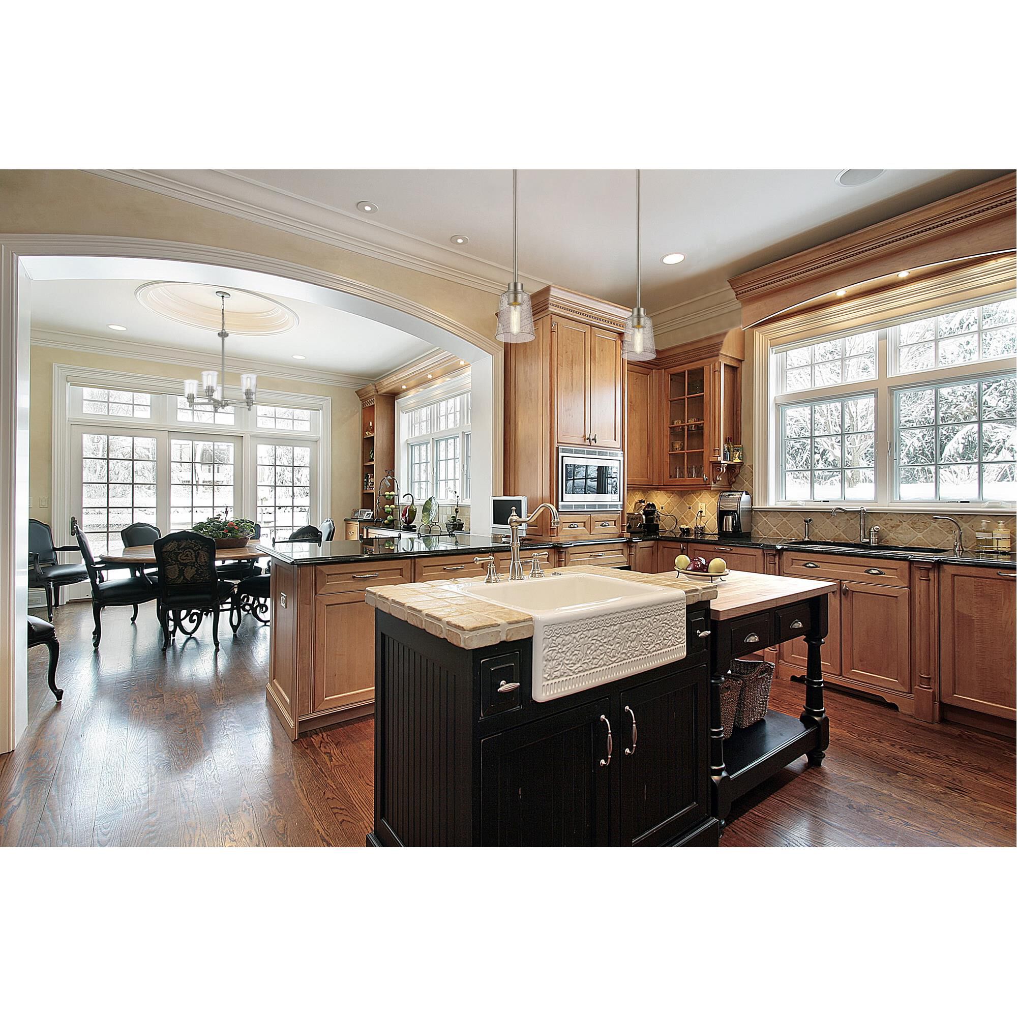 Shown in Brushed Nickel finish and Glass shade