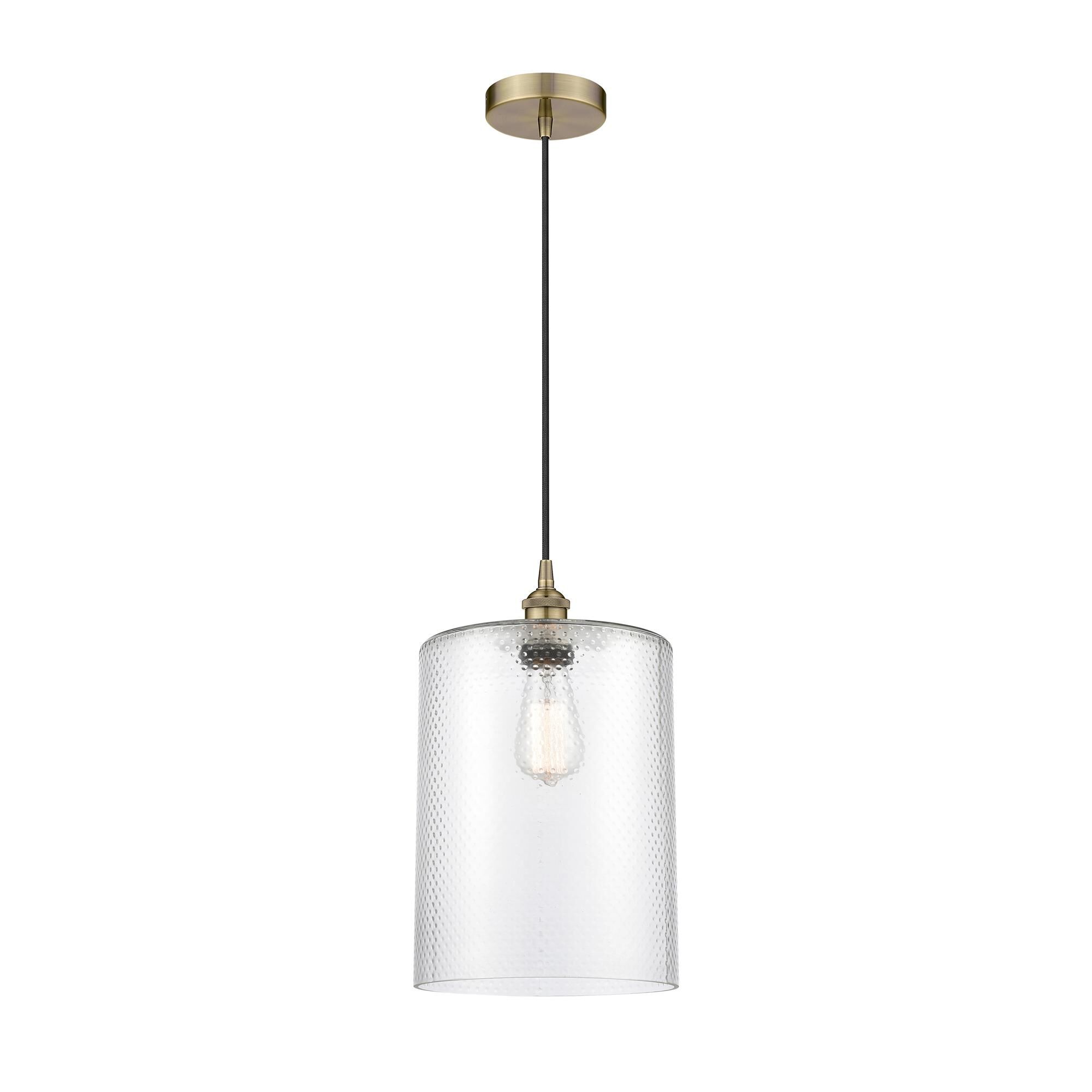 Shown in Antique Brass finish and Clear glass