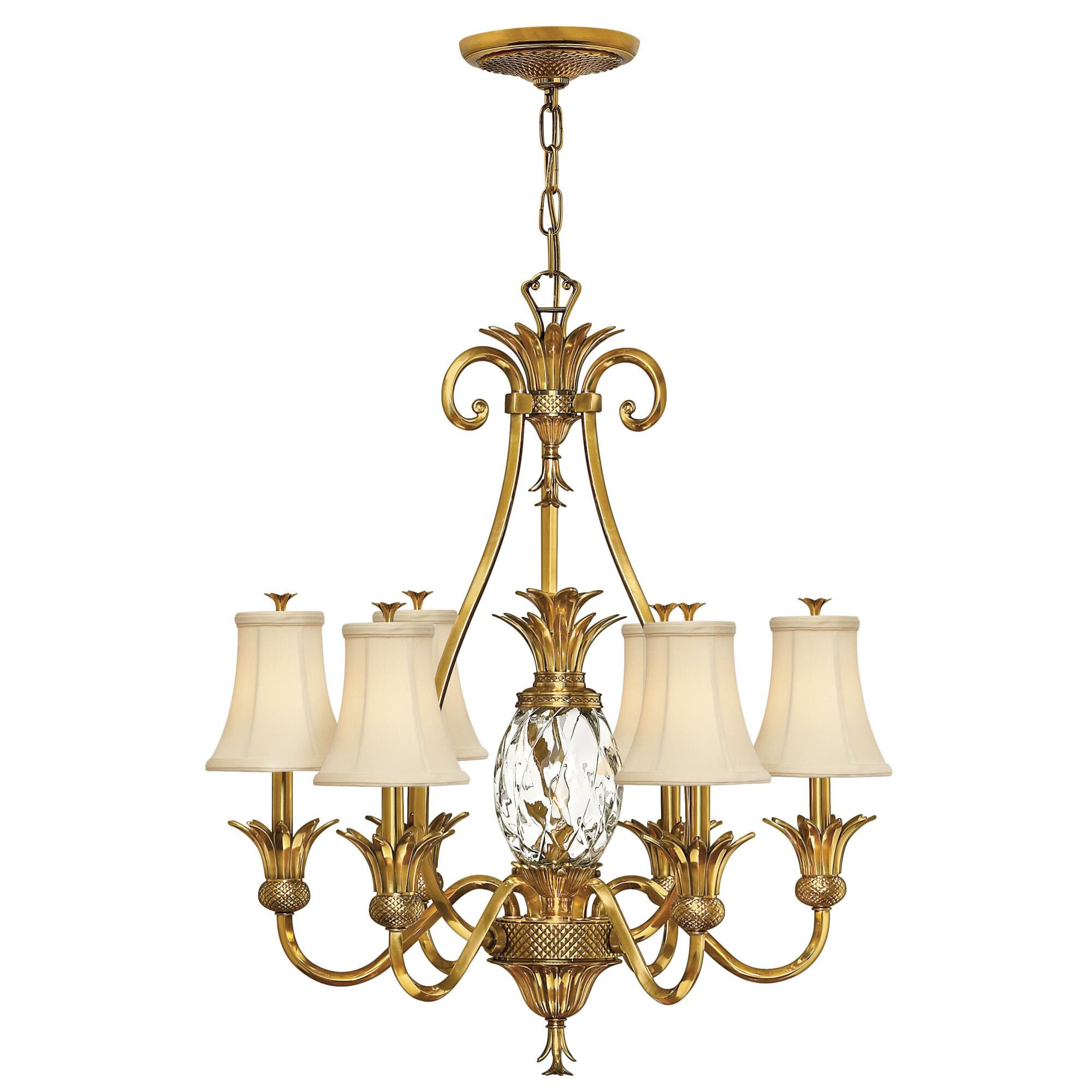 Shown in Burnished Brass finish and Clear Optic glass and Ivory Silk shade