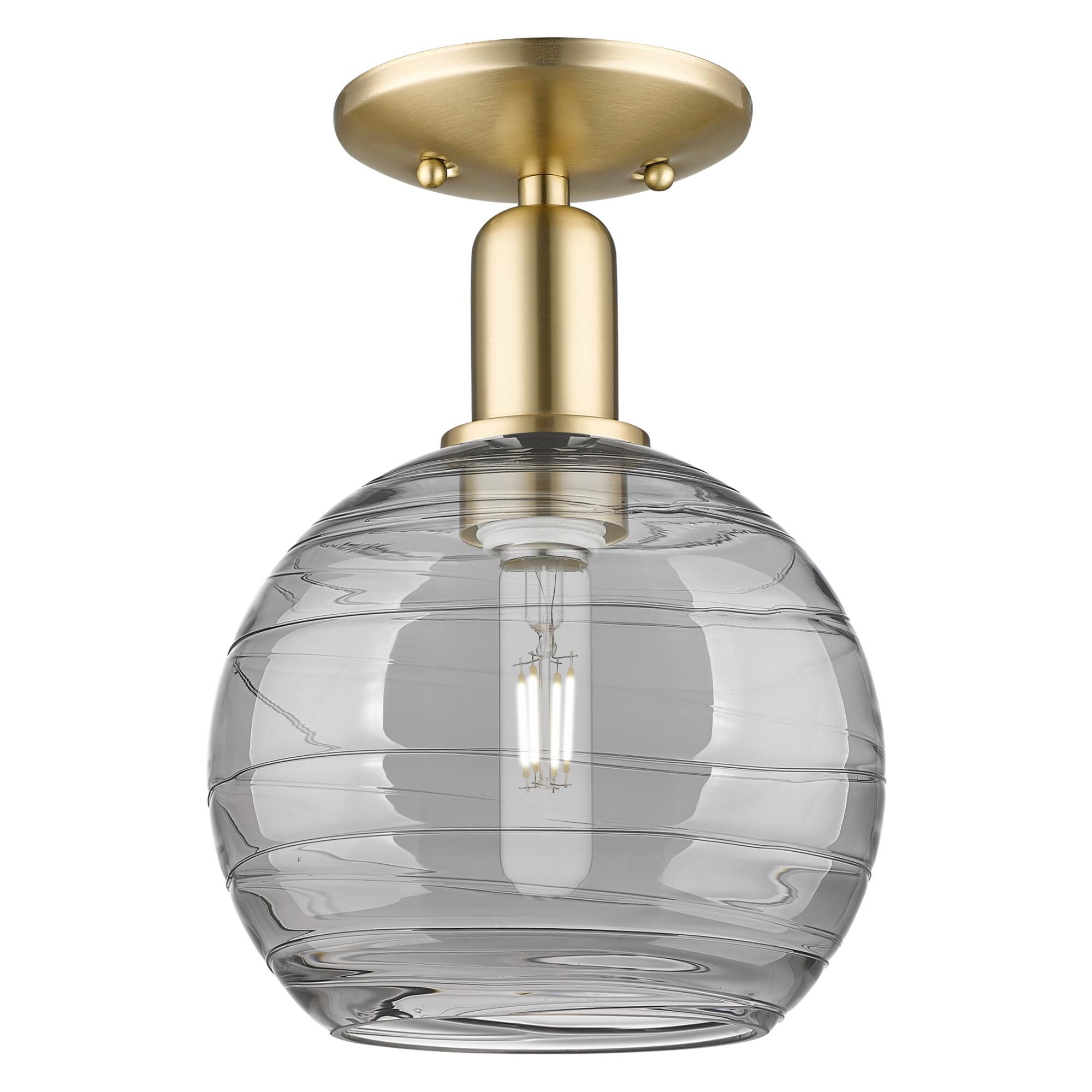 Shown in Champagne Bronze finish and Light Smoke Deco Swirl glass