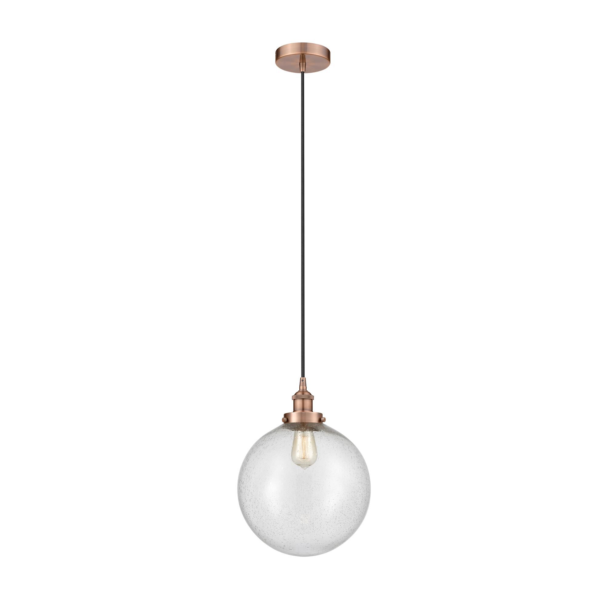 Shown in Antique Copper finish and Seedy Beacon glass