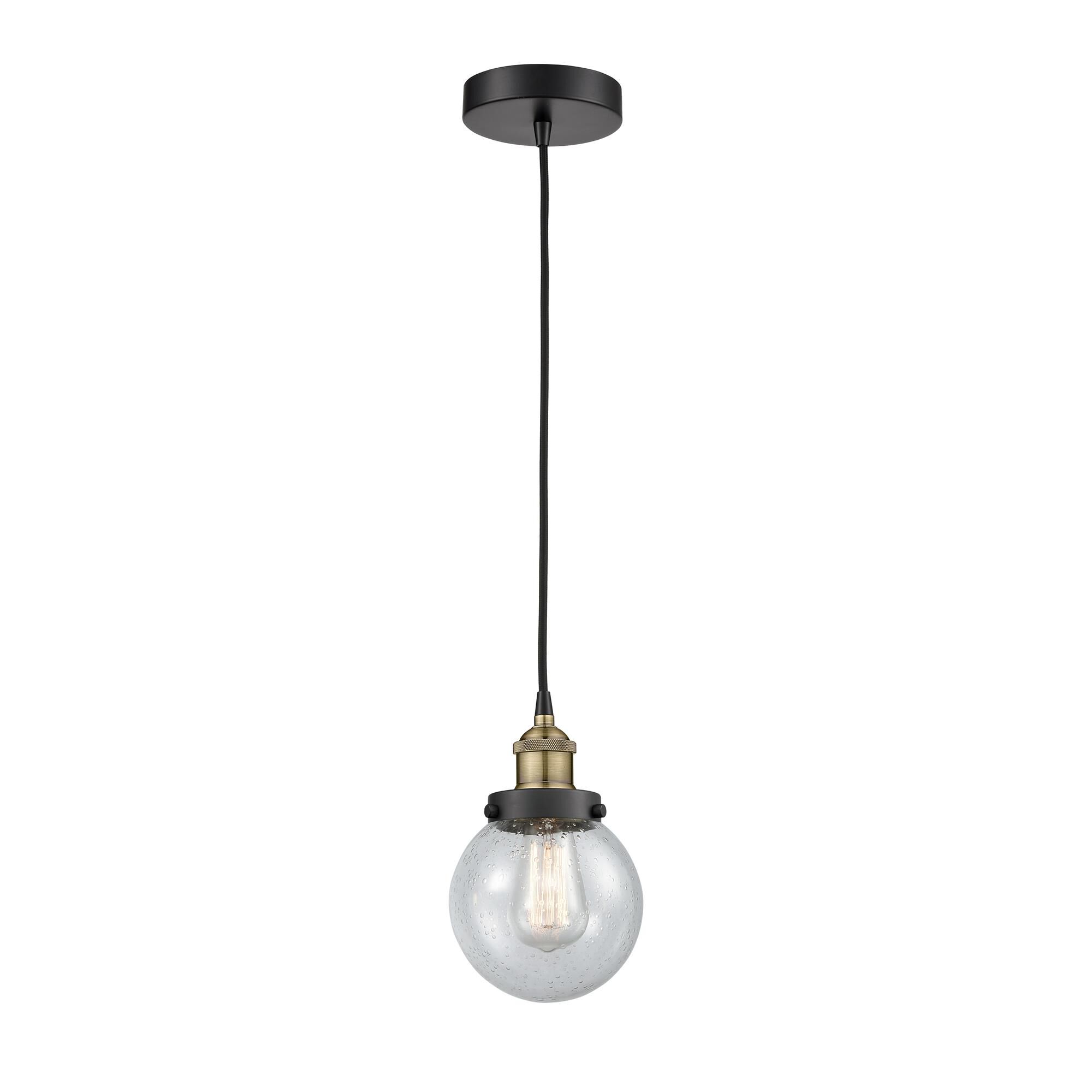 Shown in Black Antique Brass finish and Seedy glass