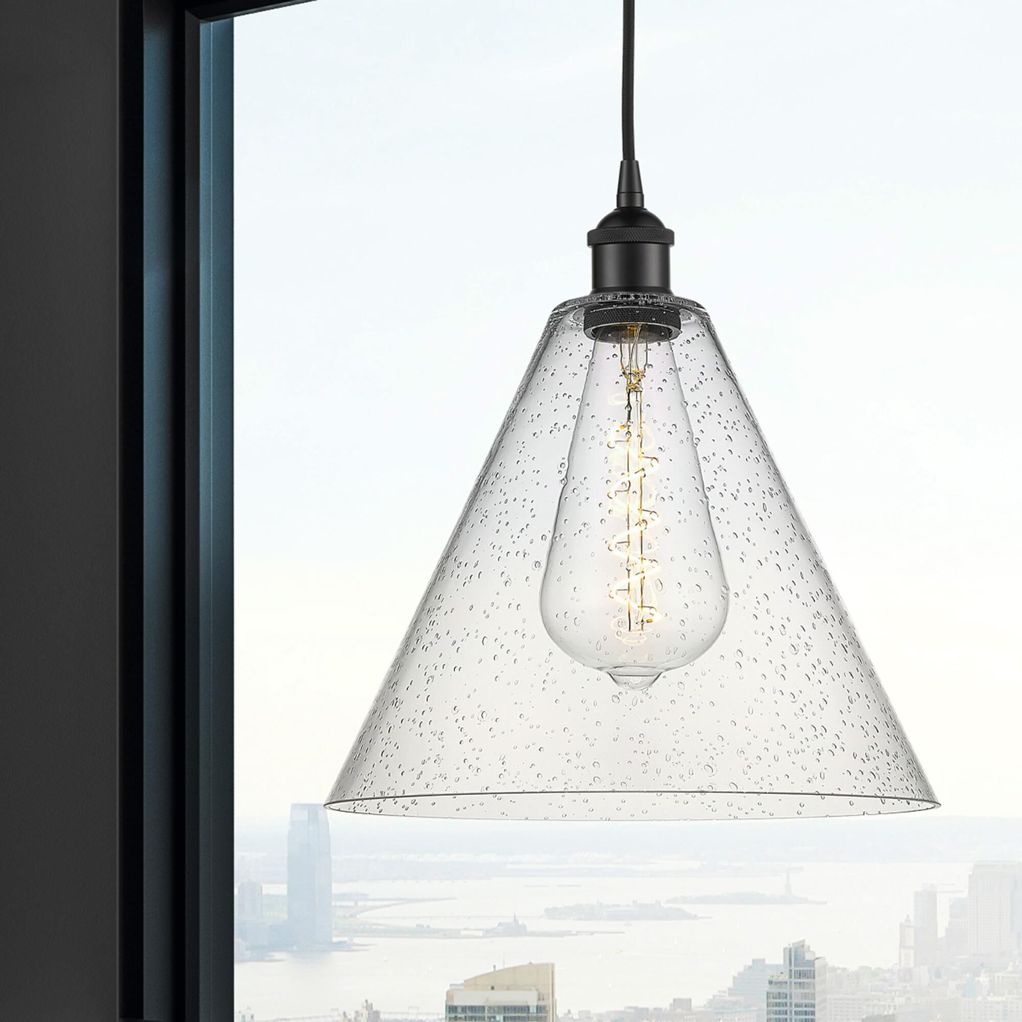 Shown in Matte Black finish and Seedy glass