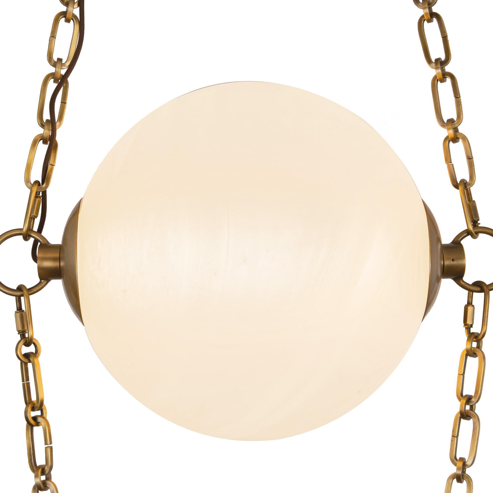 Shown in Vintage Brass finish and Cloud glass