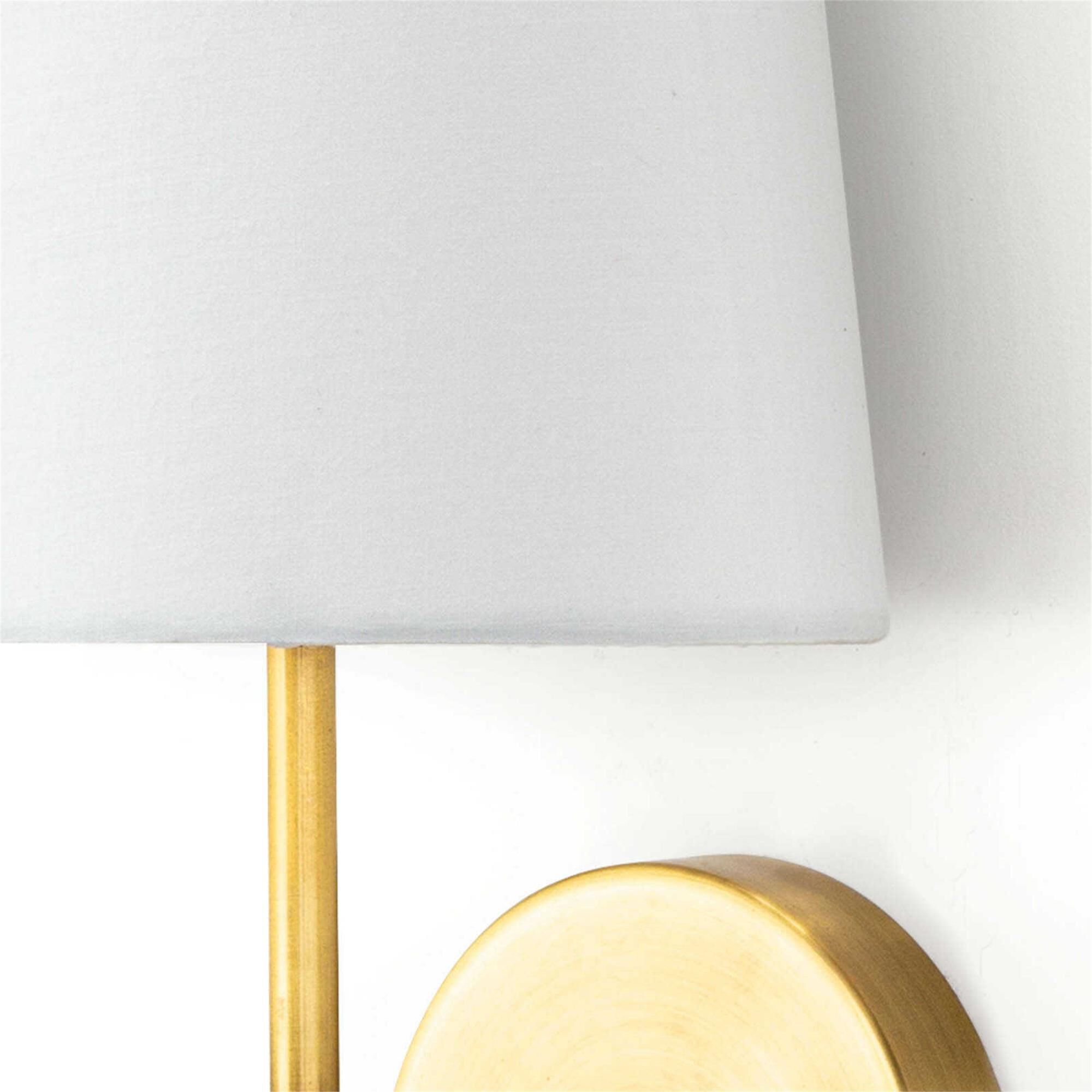 Shown in Natural Brass finish and Linen shade